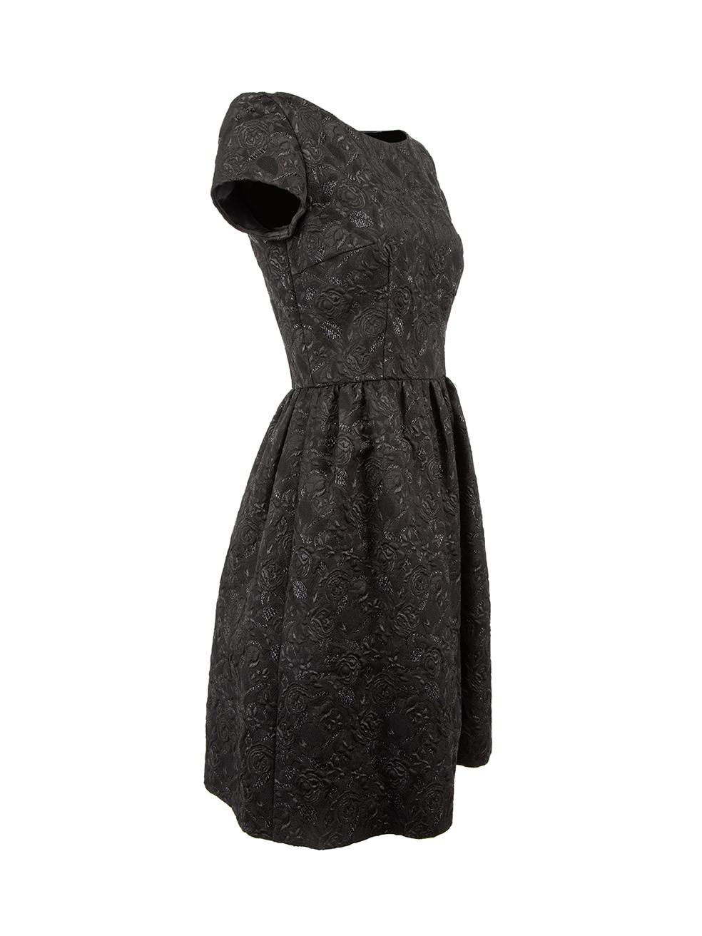 CONDITION is Very good. Minimal wear to dress is evident. Minimal wear to the underarms with light markings on this used Prada designer resale item.



Details


Black

Synthetic

Mini dress

Floral metallic jacquard pattern

Boat neckline

Short