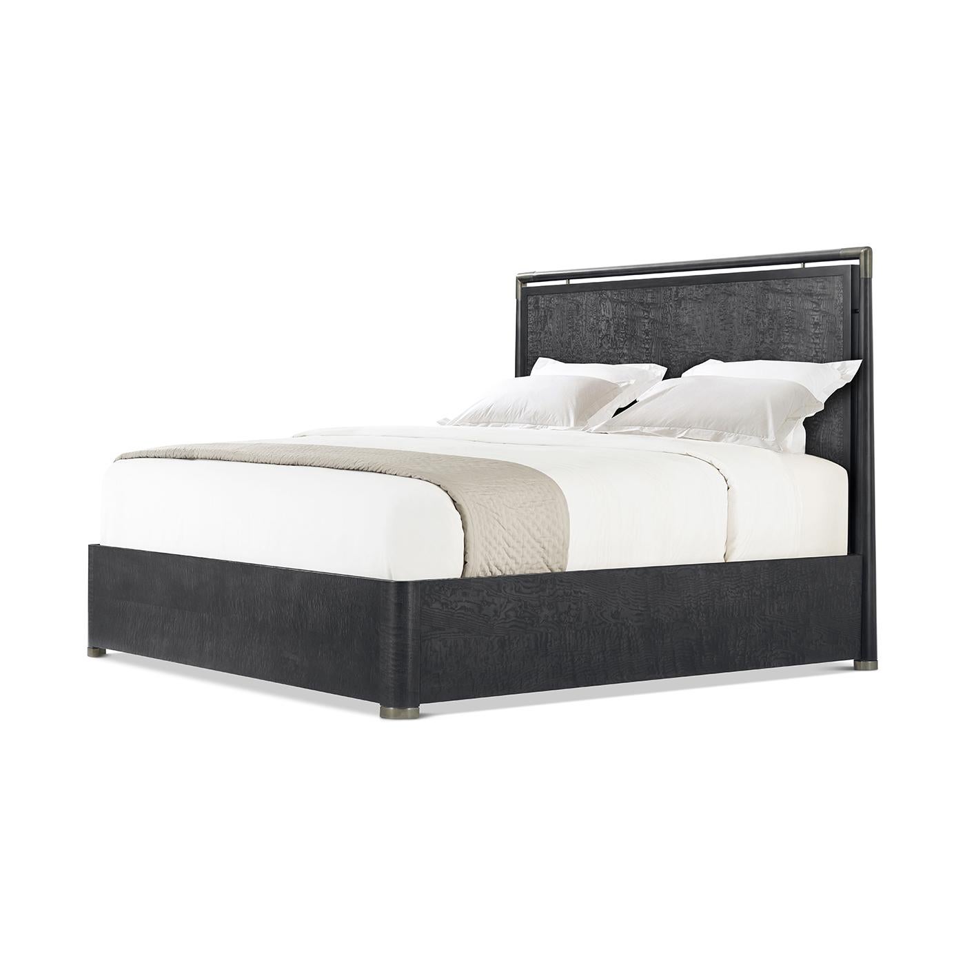 A masterpiece of design and craftsmanship. This stunning piece features graceful curves and a rich Tamo ash veneer, showcasing the beauty of natural wood in a sophisticated Silent black finish. The satin brass accents add a touch of luxury,