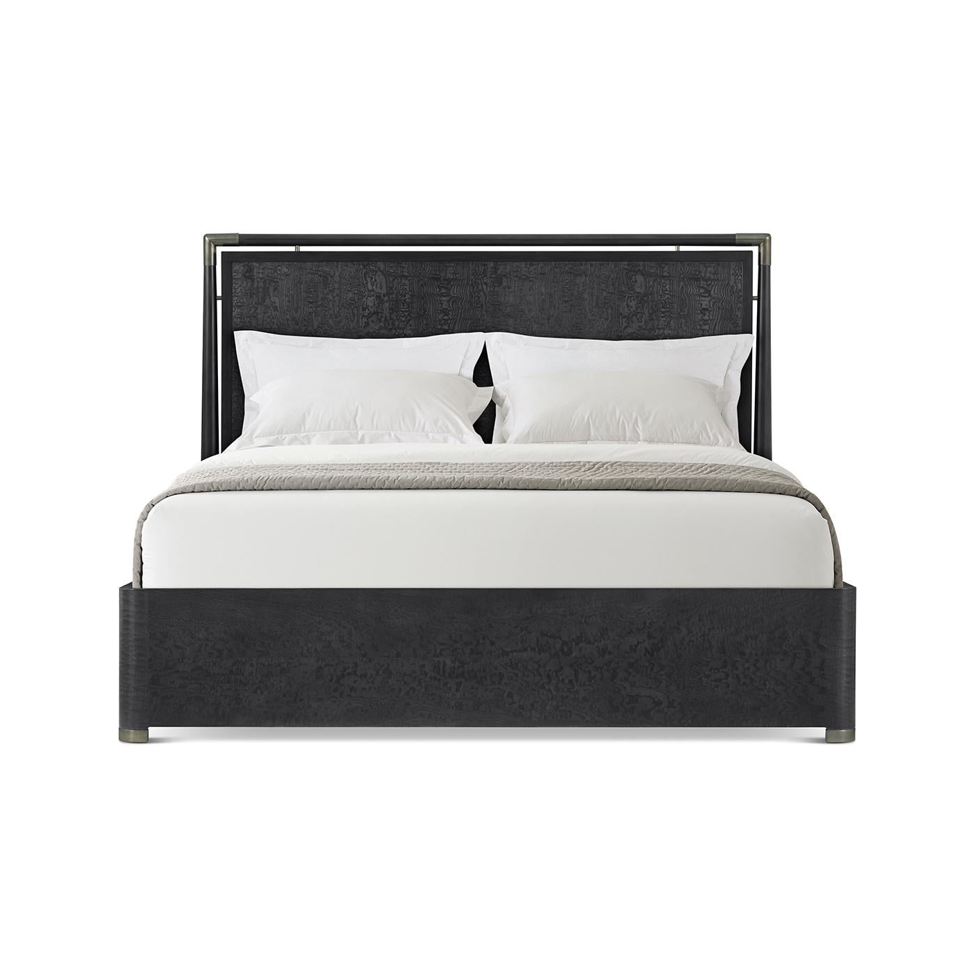 A masterpiece of design and craftsmanship. This stunning piece features graceful curves and a rich Tamo ash veneer, showcasing the beauty of natural wood in a sophisticated Silent black finish. The satin brass accents add a touch of luxury,