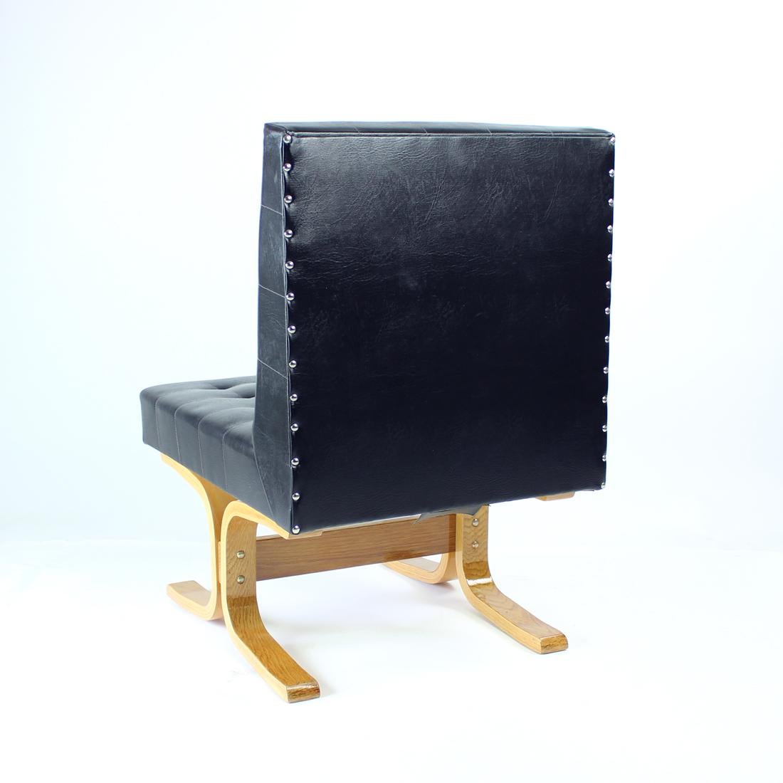 Mid-Century Modern Black Midcentury Lounge Chair Bratislava by Jindrich Volak for Drevopodnik Holes For Sale