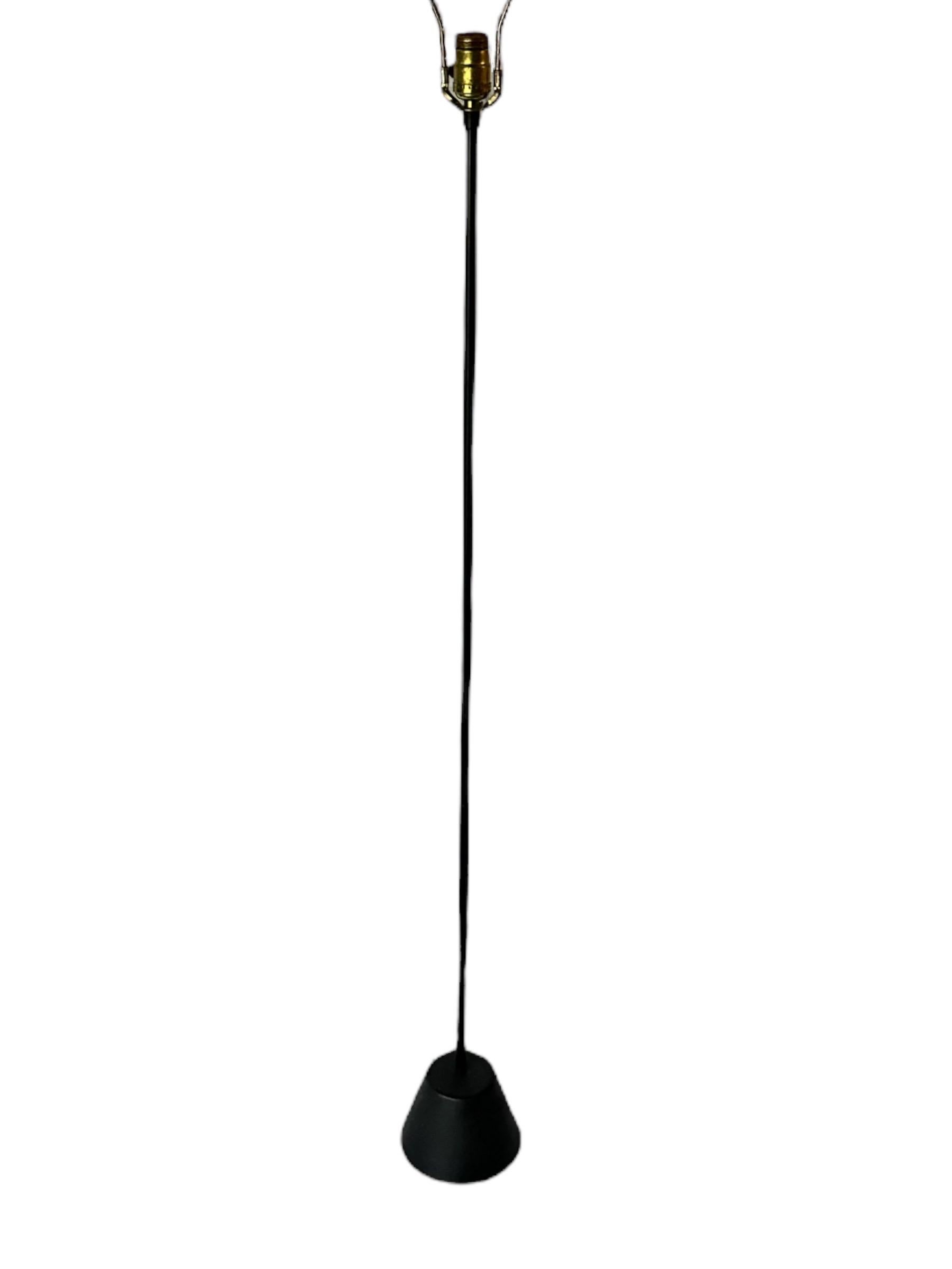 Elegant minimalist black floor lamp. Thin metal pole anchored by heavy and chic tapered base. Shade available for additional $99. We also have a second one available in yellow.