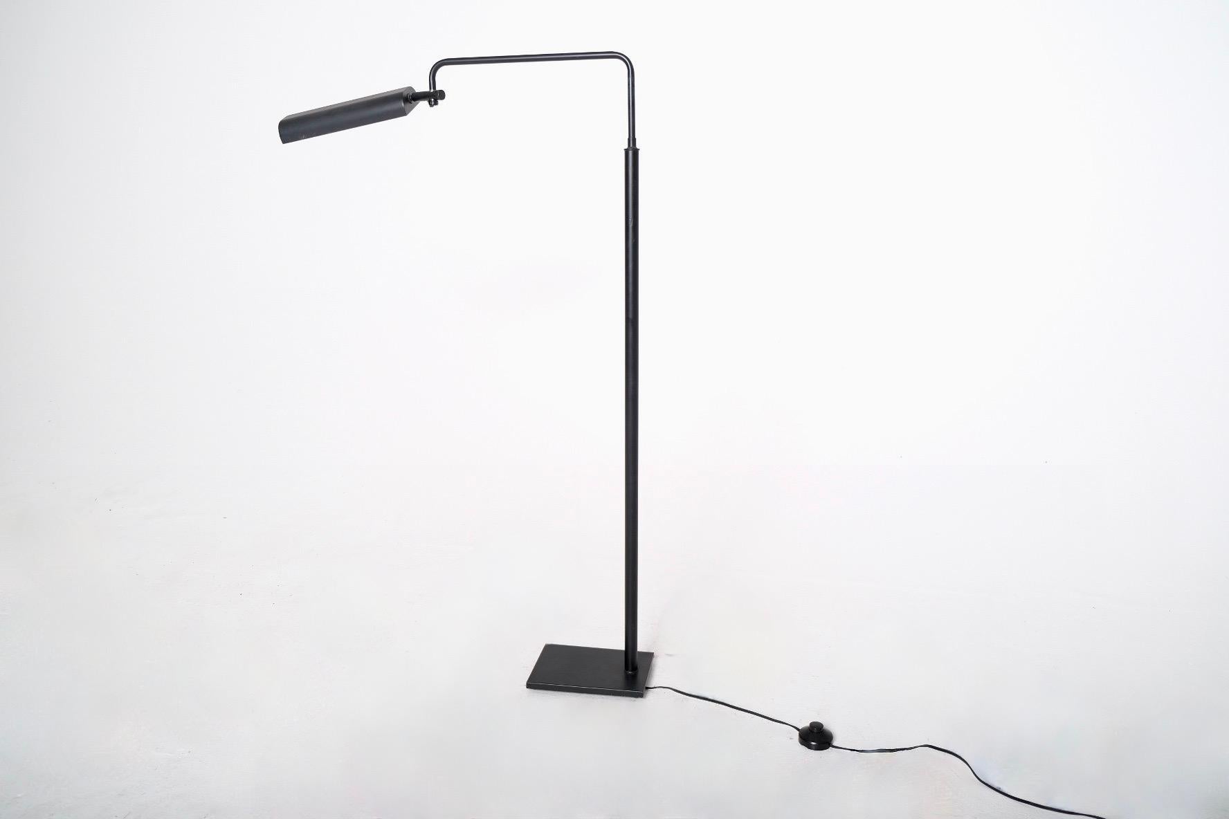 Enamel Black Minimalist Italian Adjustable Floor Lamp with Swiveling Arm For Sale