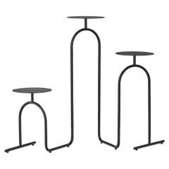 Table à piédestal noir minimaliste