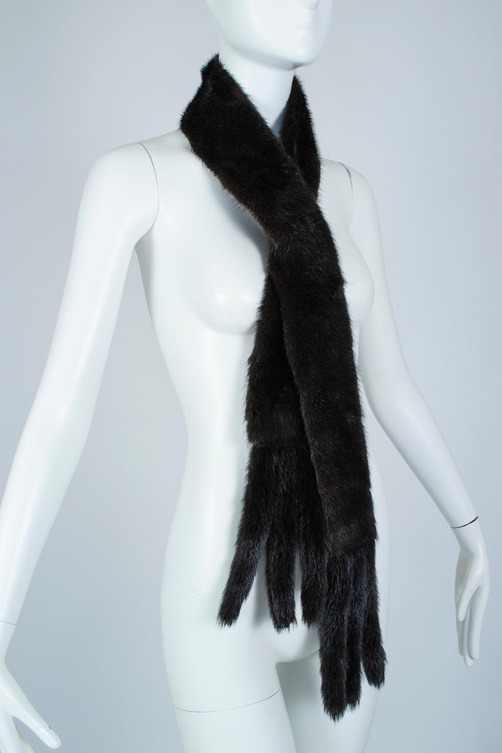 Fur shoulder cowls are as timeless as a set of pearls; supremely ladylike, tasteful and essential with strapless dresses, they will never go out of style.  The narrow design permits styling as scarf or belt, and the quilted satin lining is a subtle