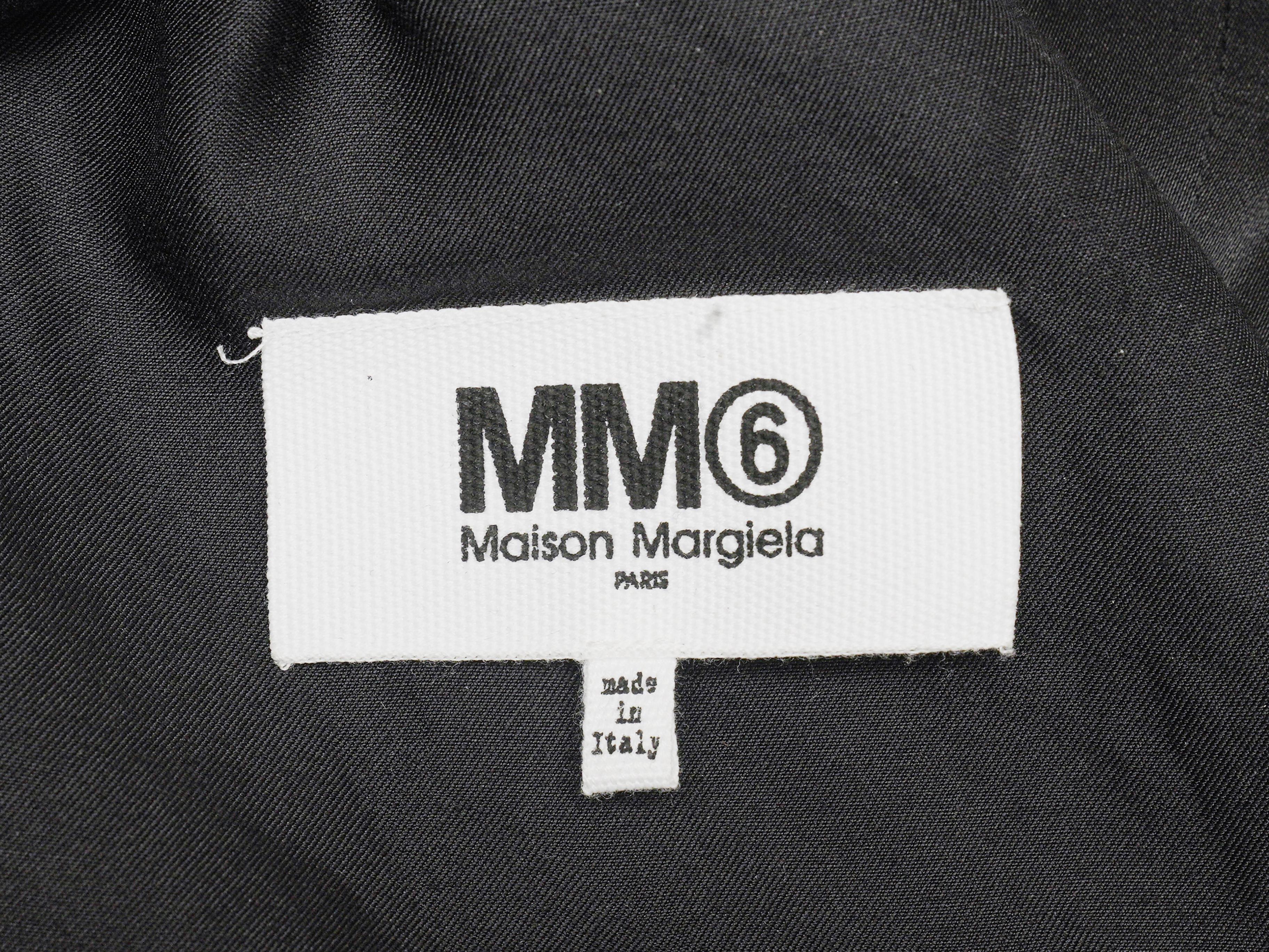 Product Details: Black satin sleeveless top by MM6 Maison Margiela. Crew neck. Strap accents at hem. Zip closure at back. 36
