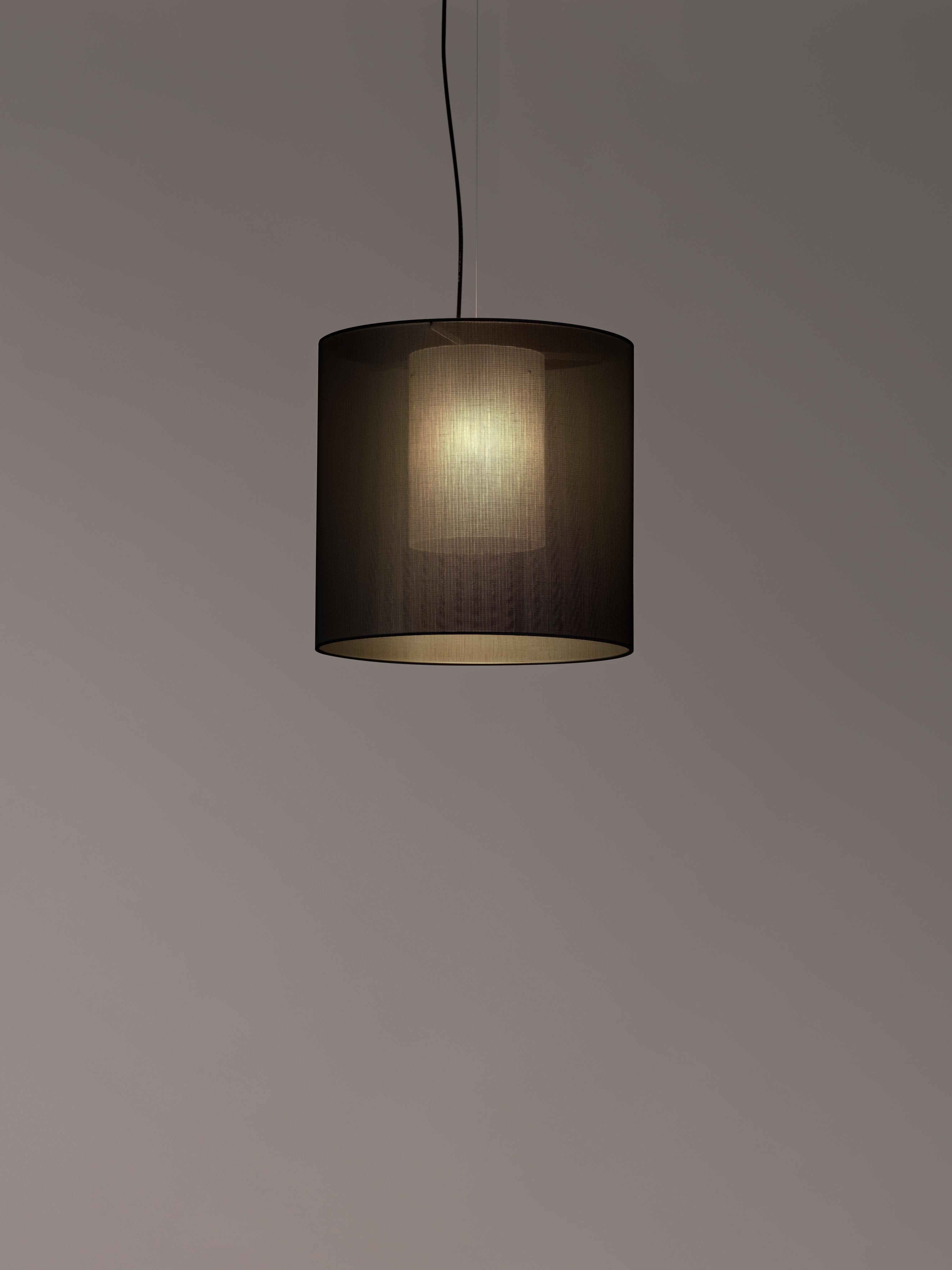 Black Moaré M pendant lamp by Antoni Arola
Dimensions: D 46 x H 45 cm
Materials: Metal, polyester.
Available in other colors and sizes.

Moaré’s multiple combinations of formats and colours make it highly versatile. The series takes its name from