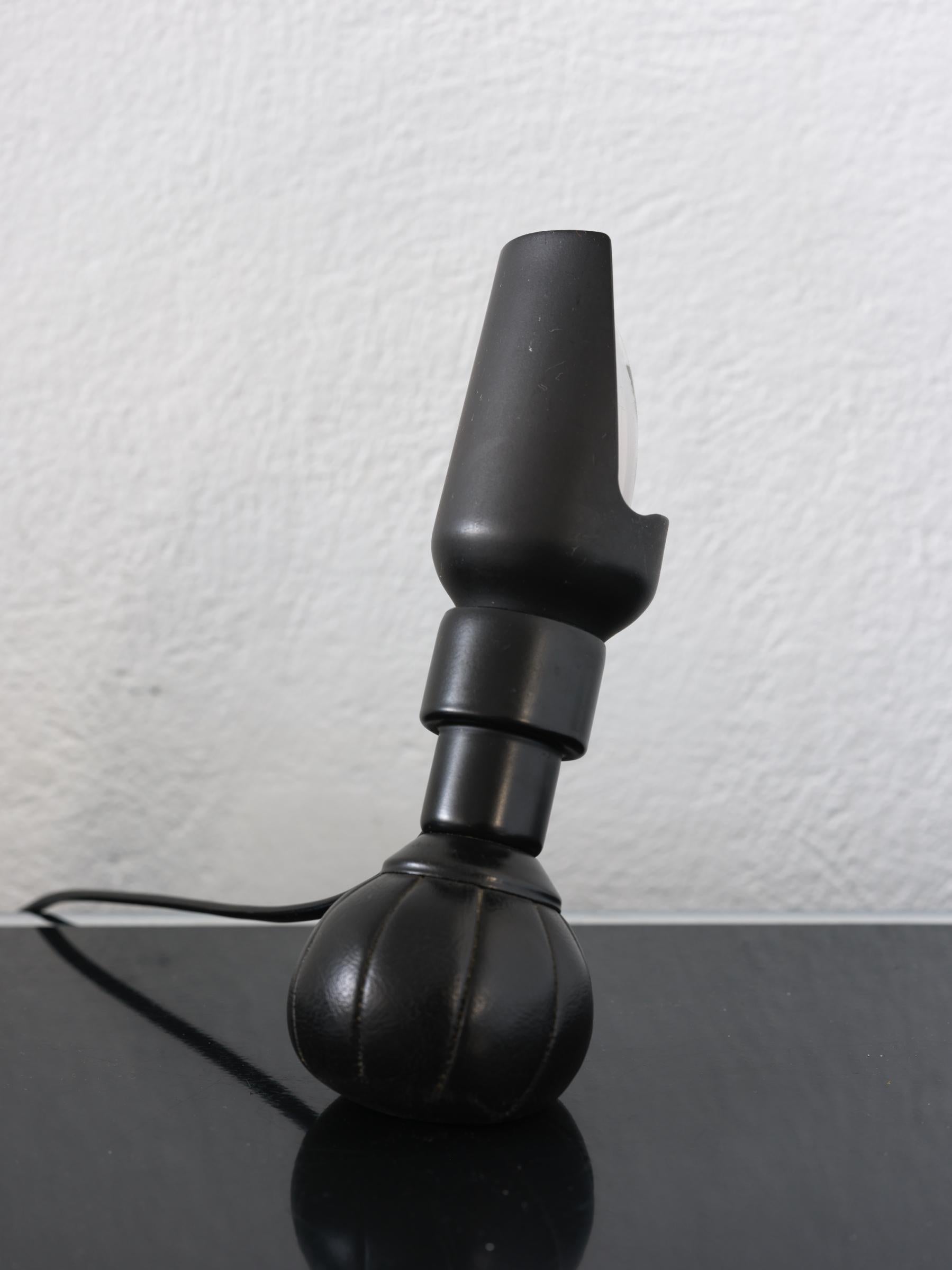 Black model P600 by Gino Scarfatti produced by Artleuce Milano period 1960/1969 without any identification mark or logo, perfectly functional completely original with slight signs of age. 