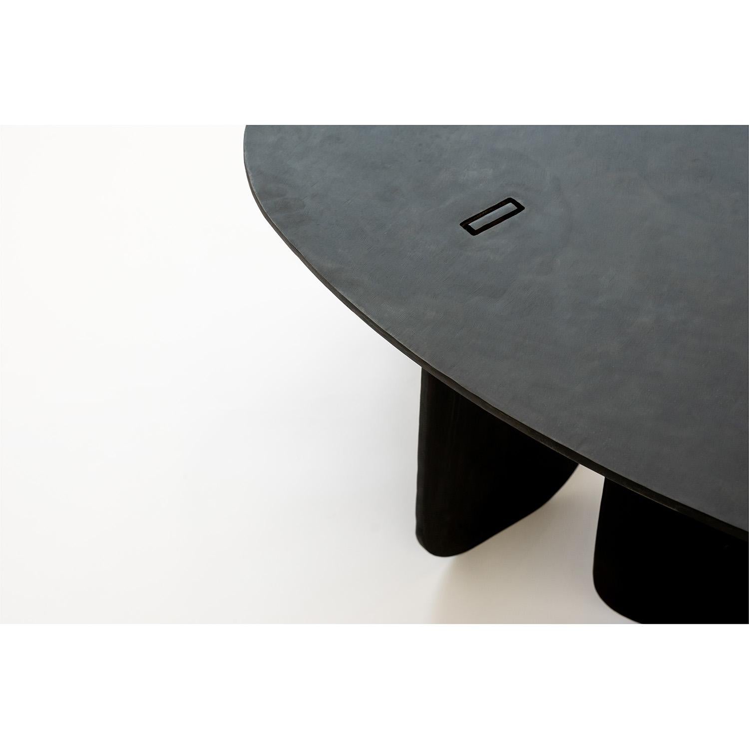 TABLE NO. 15 - SIDE TABLE 
J.M. Szymanski
d. 2019

This Noguchi-inspired side table is handcrafted in 3/8” thick steel, with a natural black patina and wax finish, to create an ulta-modern and inspired look. 

Custom sizes available. Made in the