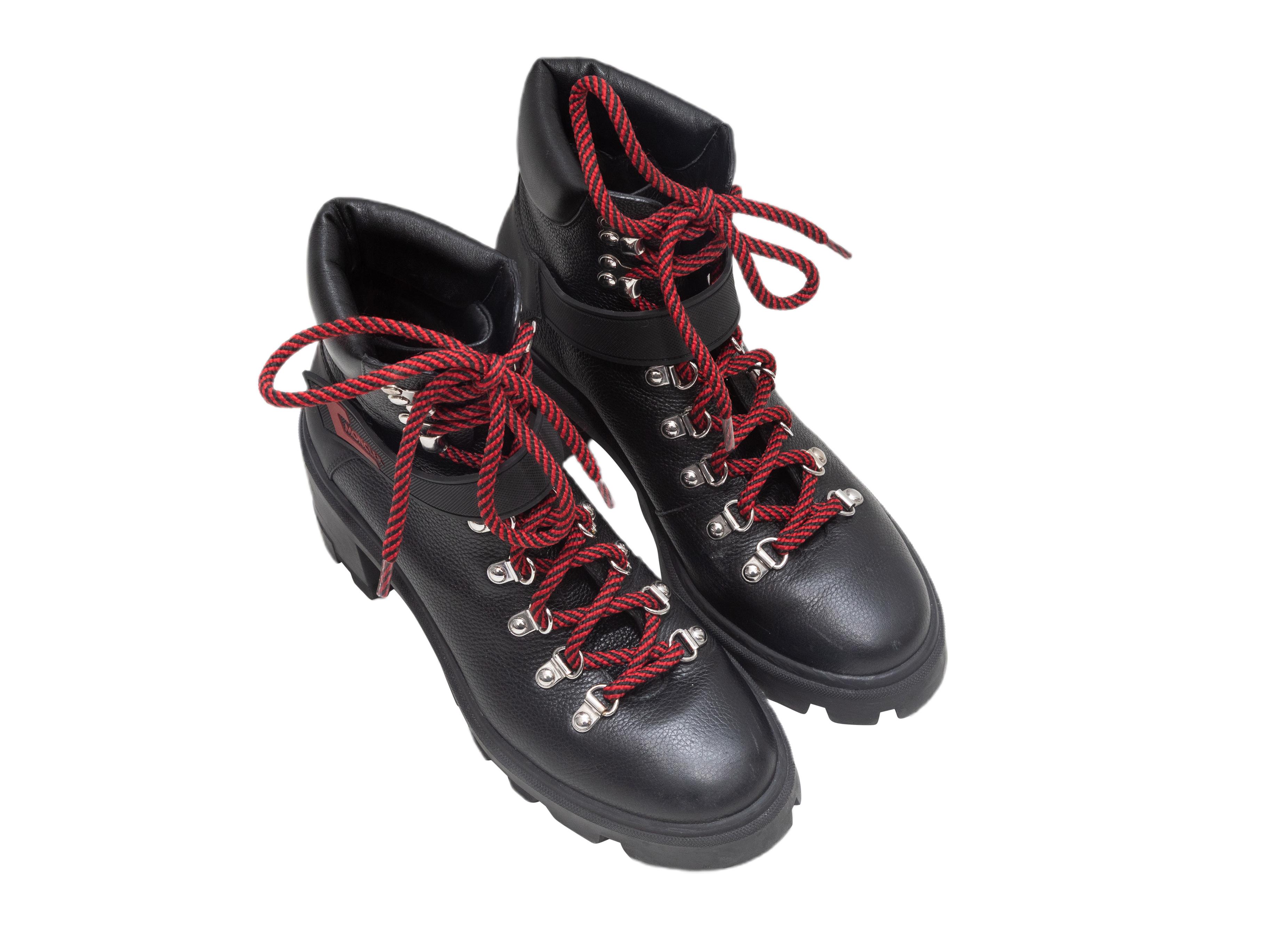 Schwarze Schnürstiefel Carol von Moncler aus Leder mit Absätzen. Sohlen aus Gummi. Schnürung und Klettverschluss an der Spitze. 5