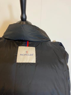 Black Moncler jacket with leather details.