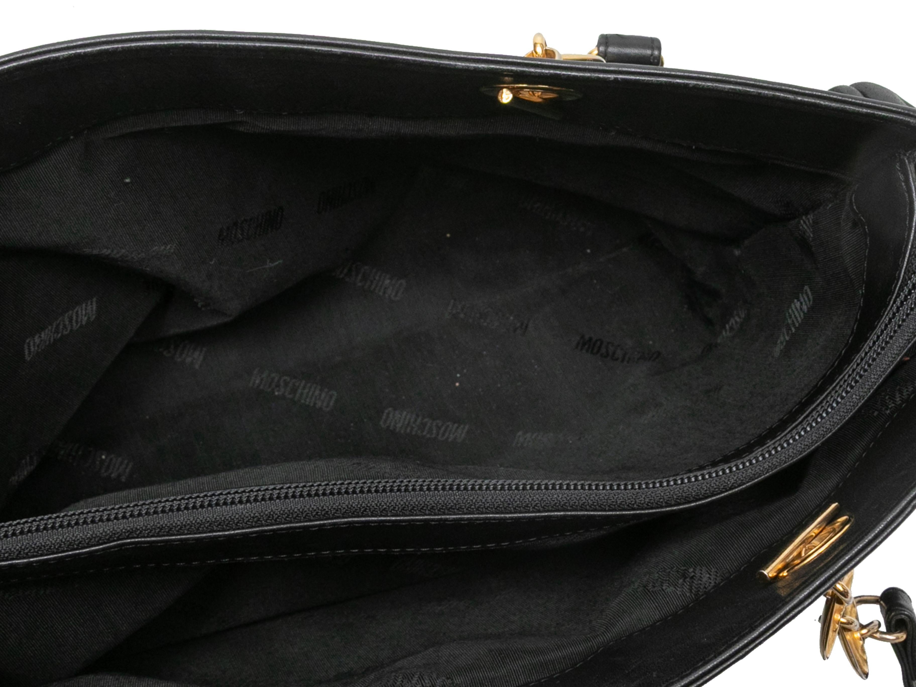 De las mujeres Bolso de hombro Moschino negro de piel acolchada con corazón en venta