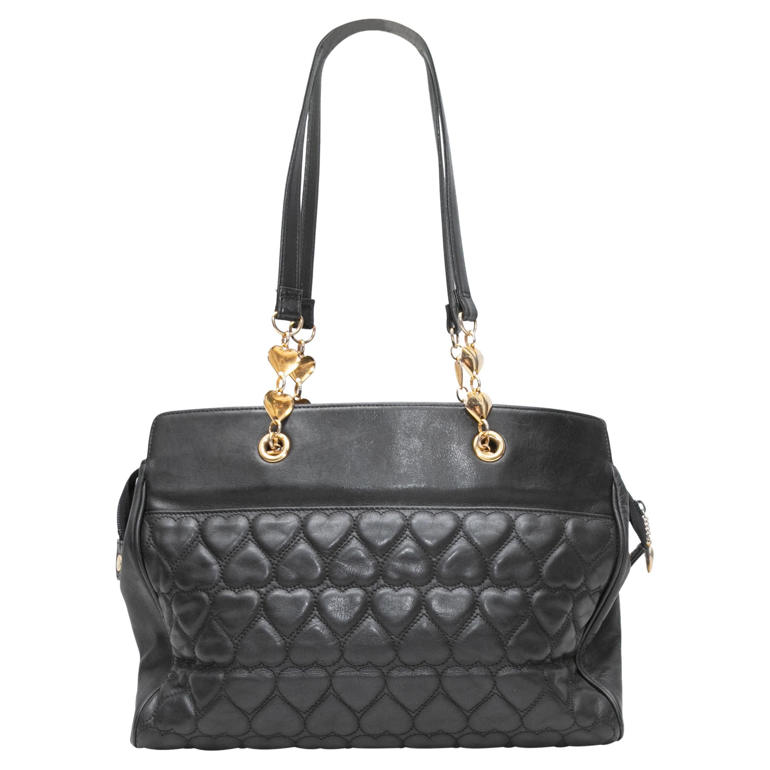 Bolso de hombro Moschino negro de piel acolchada con corazón en venta