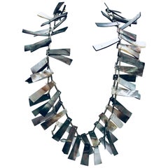 SYLVIA GOTTWALD, Black Mother of Pearl with Silver spacers Statement necklace.