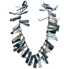 SYLVIA GOTTWALD, Black Mother of Pearl with Silver spacers Statement necklace. 