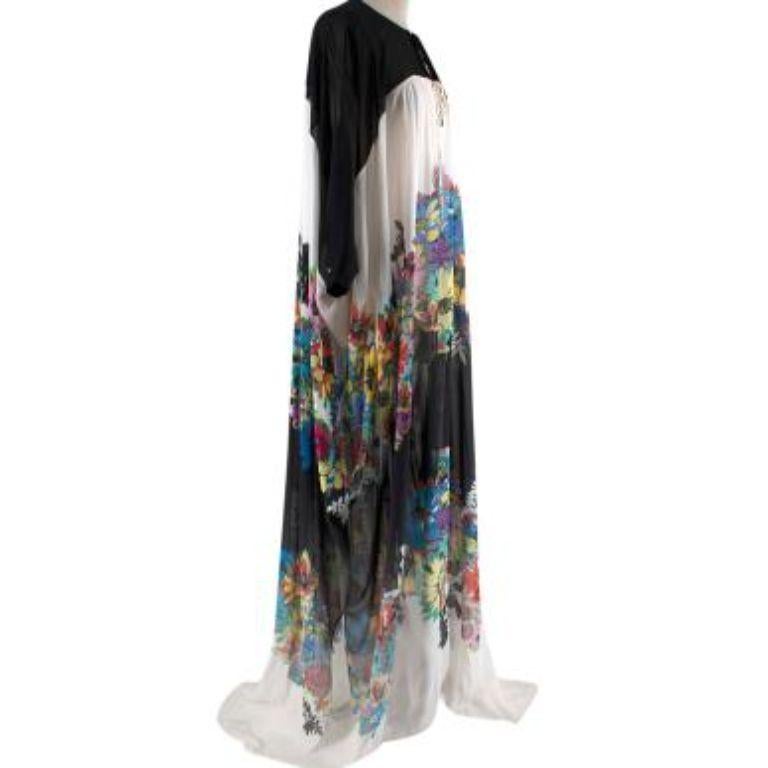 Roberto Cavalli Black/Multi Sheer Floral Kaftan
 

 - Flowy sheer kaftan
 - Two tie details on neckline 
 - Cropped sleeves with button closure on cuff 
 - Wide and boxy fit 
 

 Materials 
 100% Silk 
 

 Made in Italy 
 9/10 Good condition - small