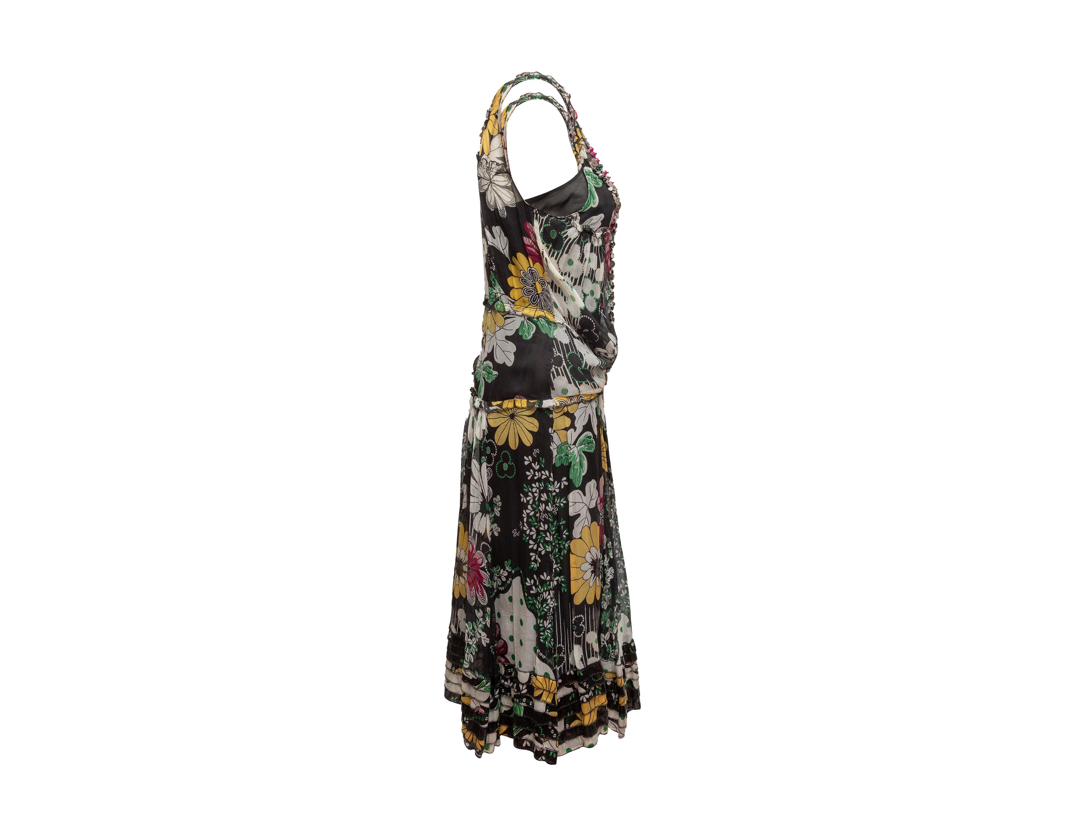 Robe sans manches en soie noire et multicolore à imprimé floral, par Blumarine. Encolure en V ornée de paillettes. Poitrine 34