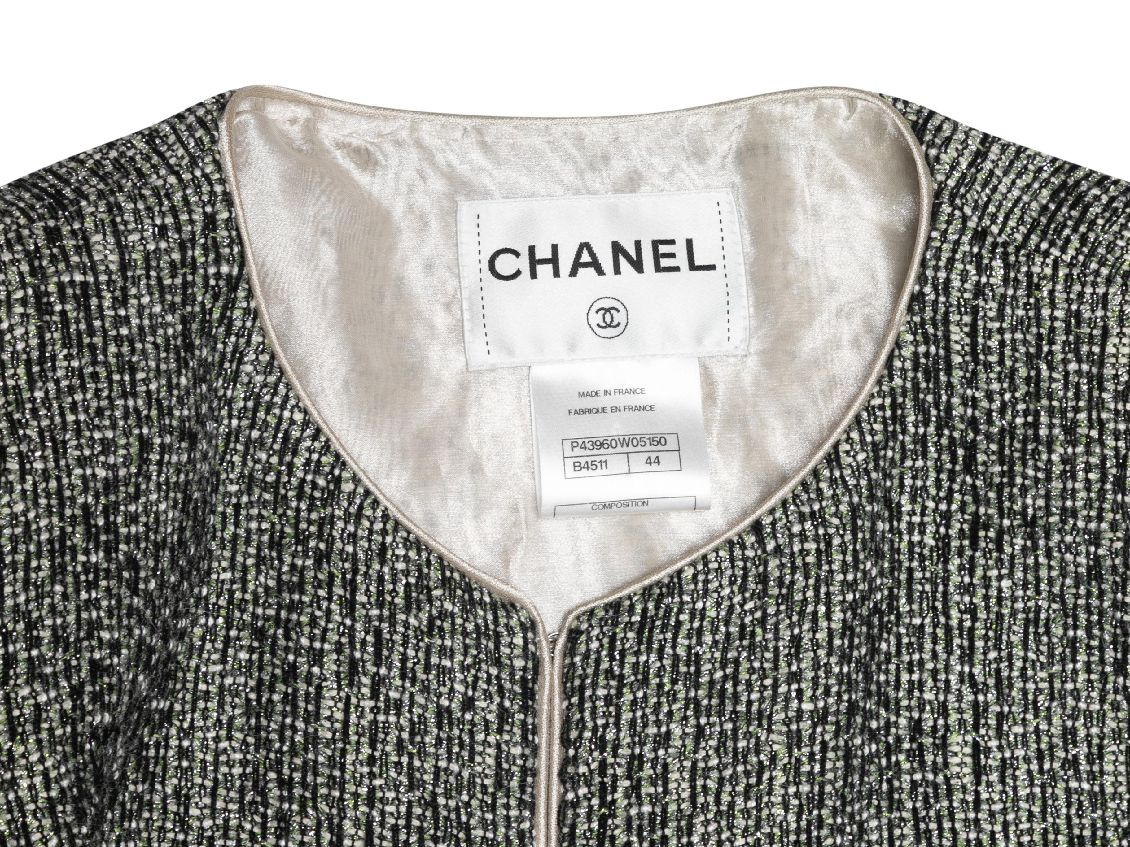 Black, green, and white alpaca-blend tweed jacket by Chanel. Crew neck. Hook-and-eye front closure. 40