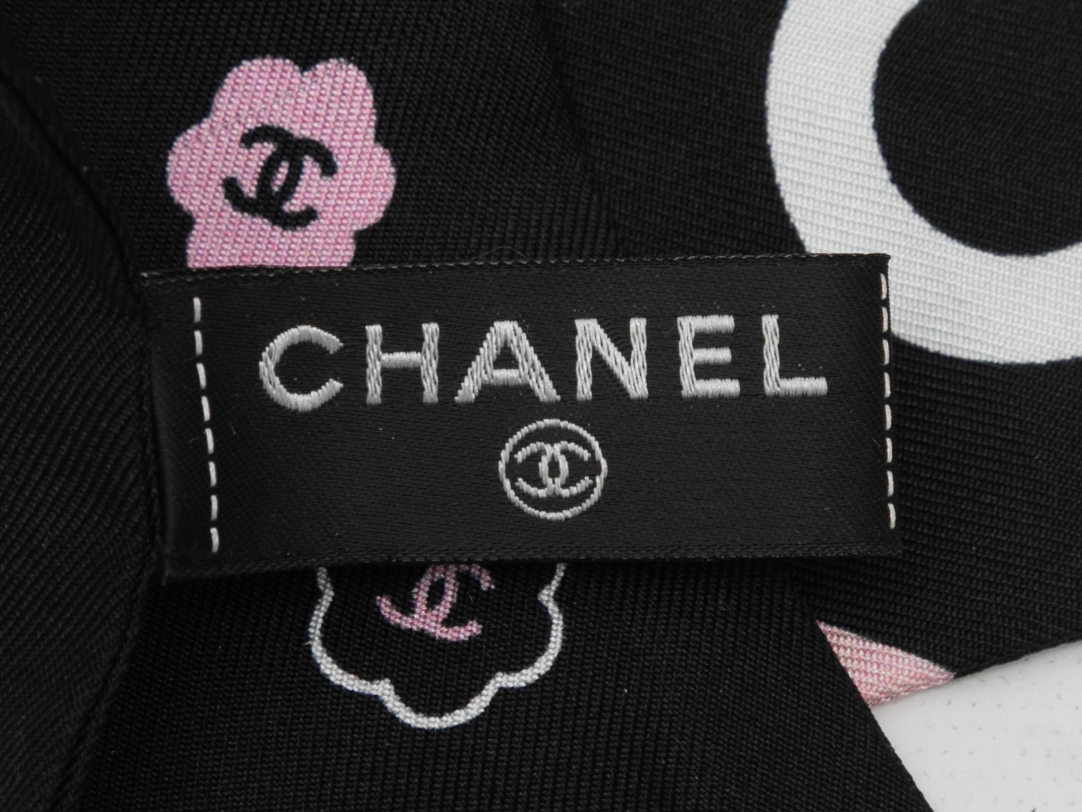 Black and multicolor silk spellout Camellia twilly scarf by Chanel. 2.25