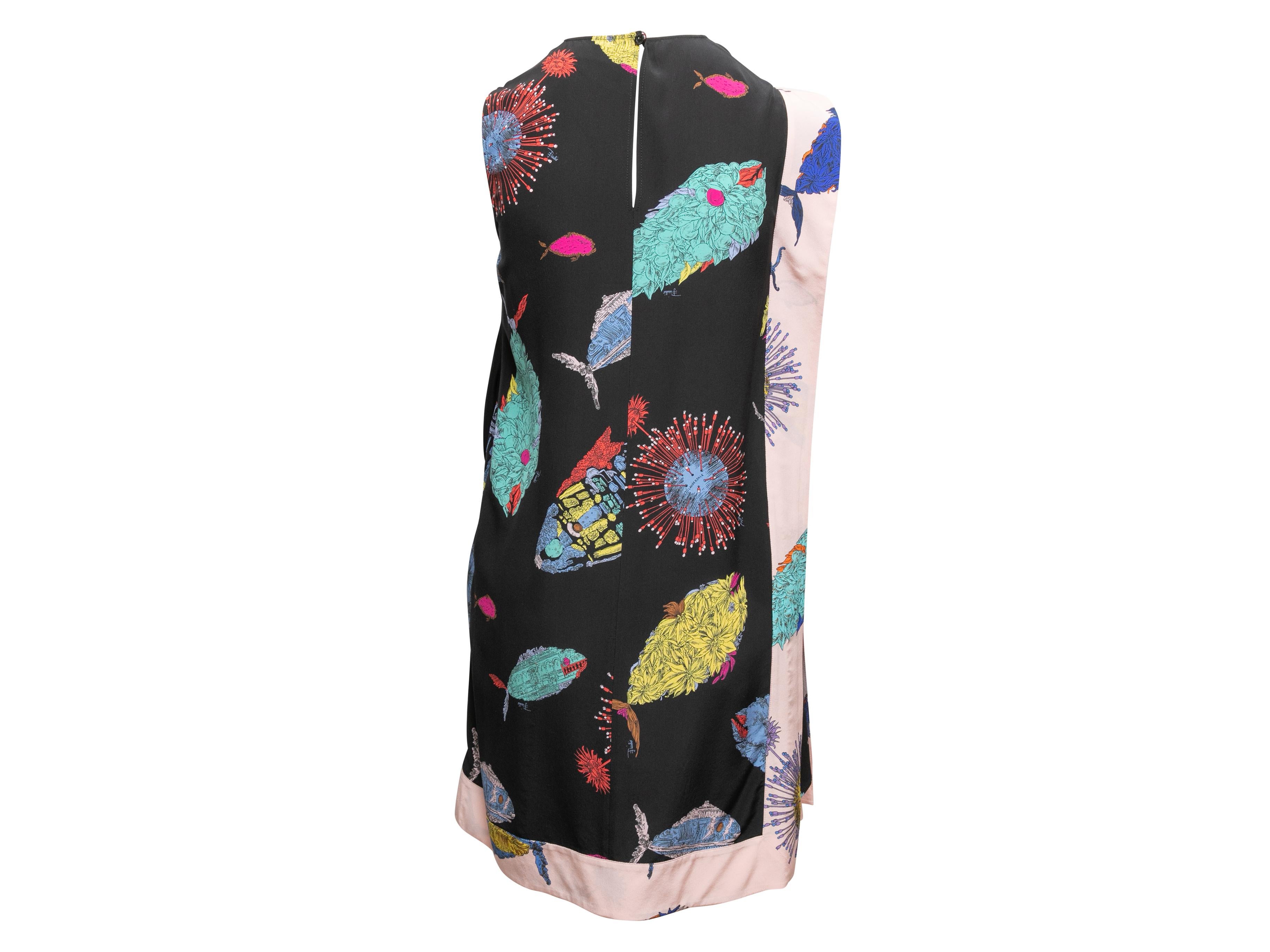 Black and multicolor silk fish print sleeveless dress by Emilio Pucci. Crew neck. Ruched tie accent at side. Keyhole featuring button closure at nape. 32