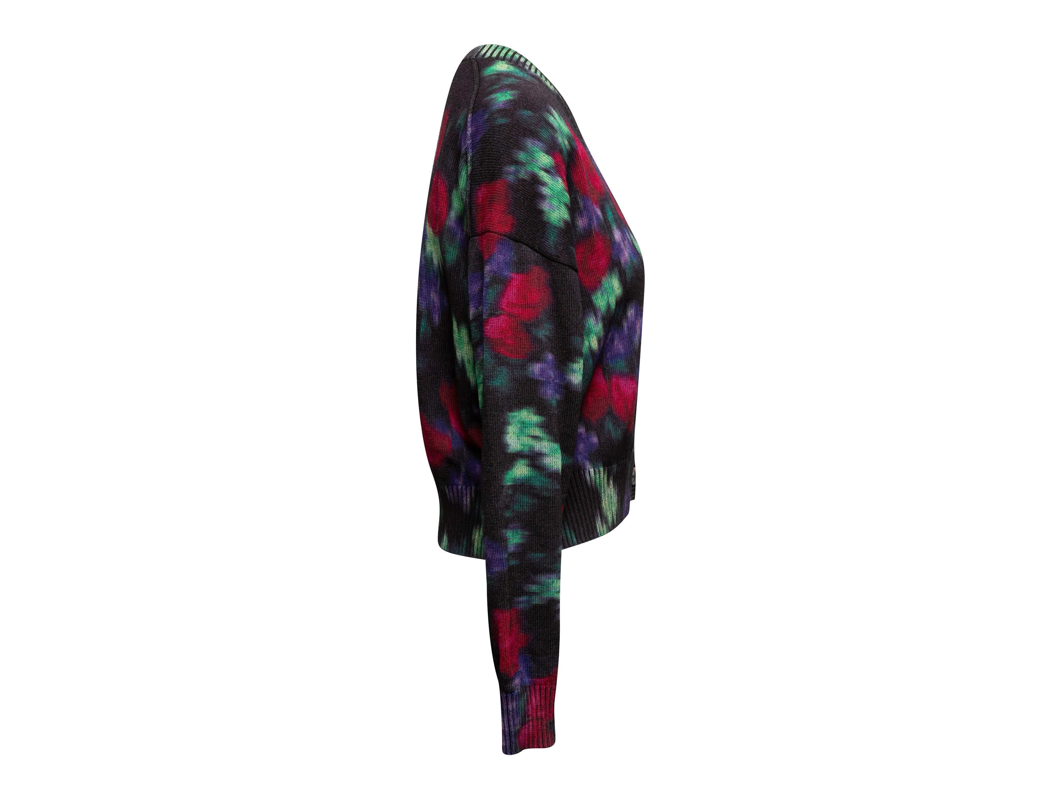 Black and multicolor watercolor floral print cardigan by Kenzo. V-neck. Button closures at center front. 44