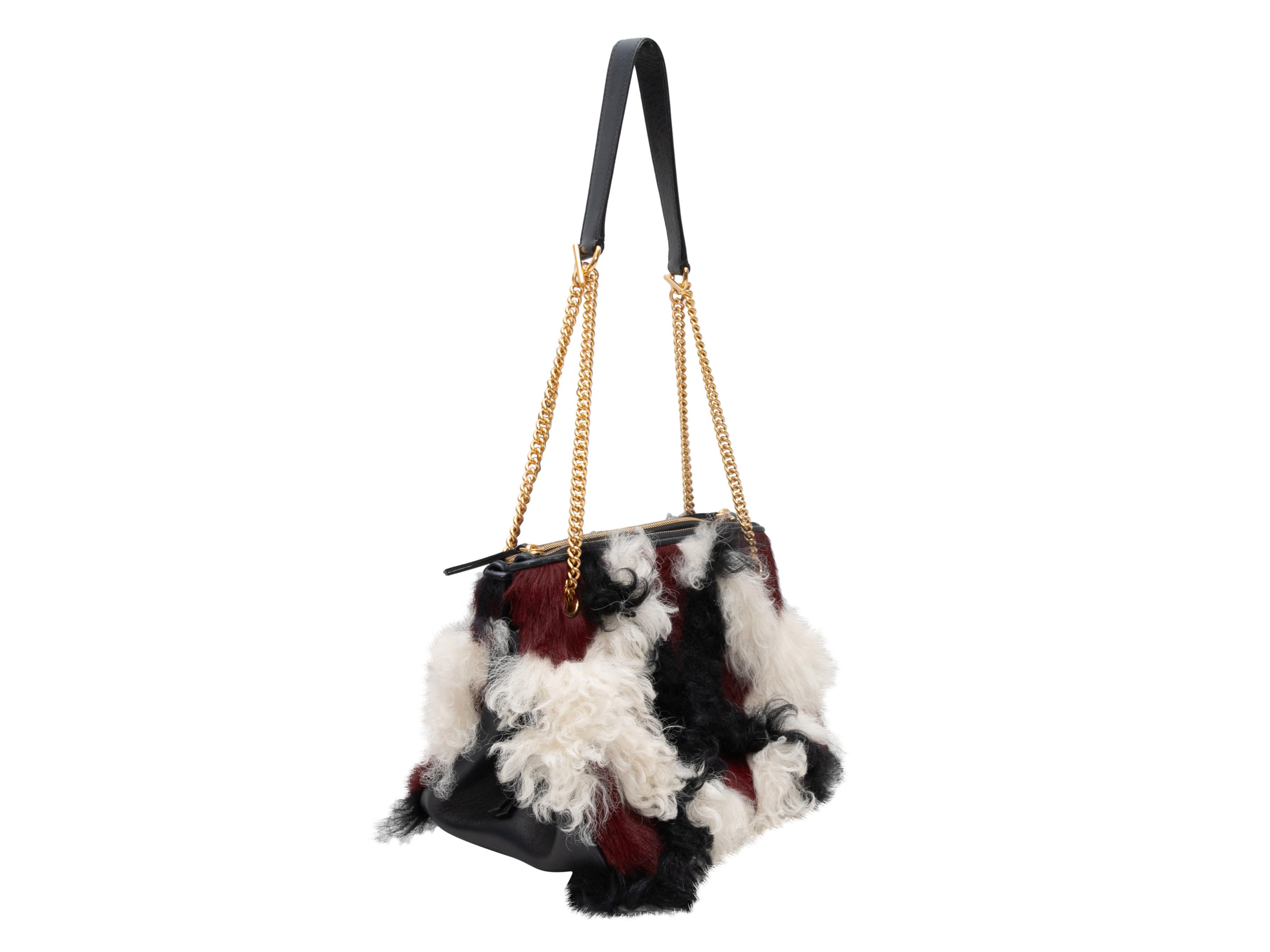 Black & Multicolor Mulberry Tartan Shearling Bag. This bag features a shearling body, gold-tone hardware, a single chain-link and leather shoulder strap, and a top zip closure. 12