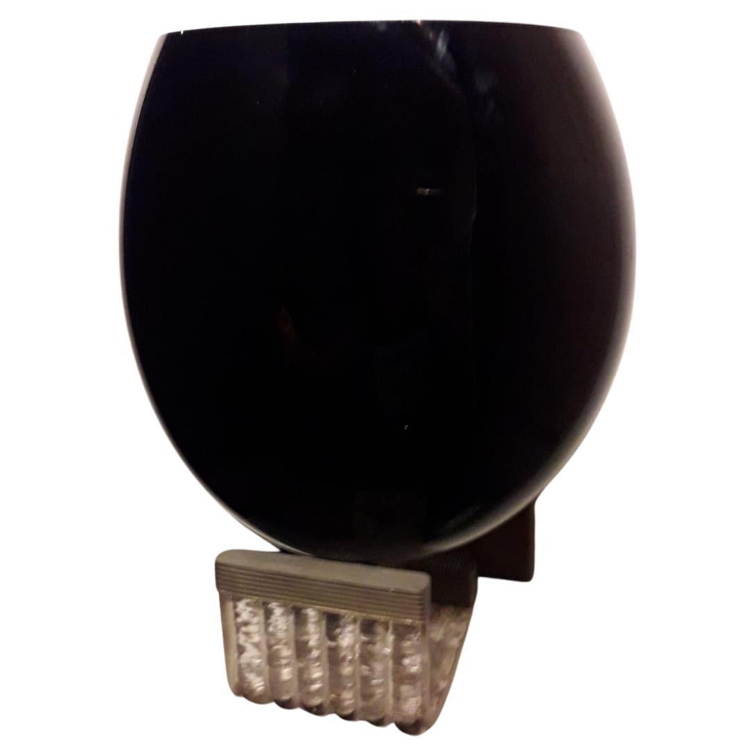 Vintage Italian uplight wall sconce with black murano glass shade and clear graniglia glass leaf mounted on brass frame / Made in Italy by Barovier e Toso, circa 1950s
Measures: Height 14.5 inches, width 10.5 inches, depth 8 inches
1 light / E12 or