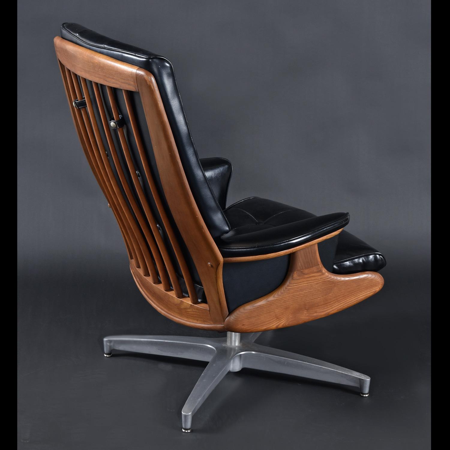 Mid-20th Century Black Naugahyde Heywood Wakefield 710d Swivel Rocker Lounge Chair and Ottoman