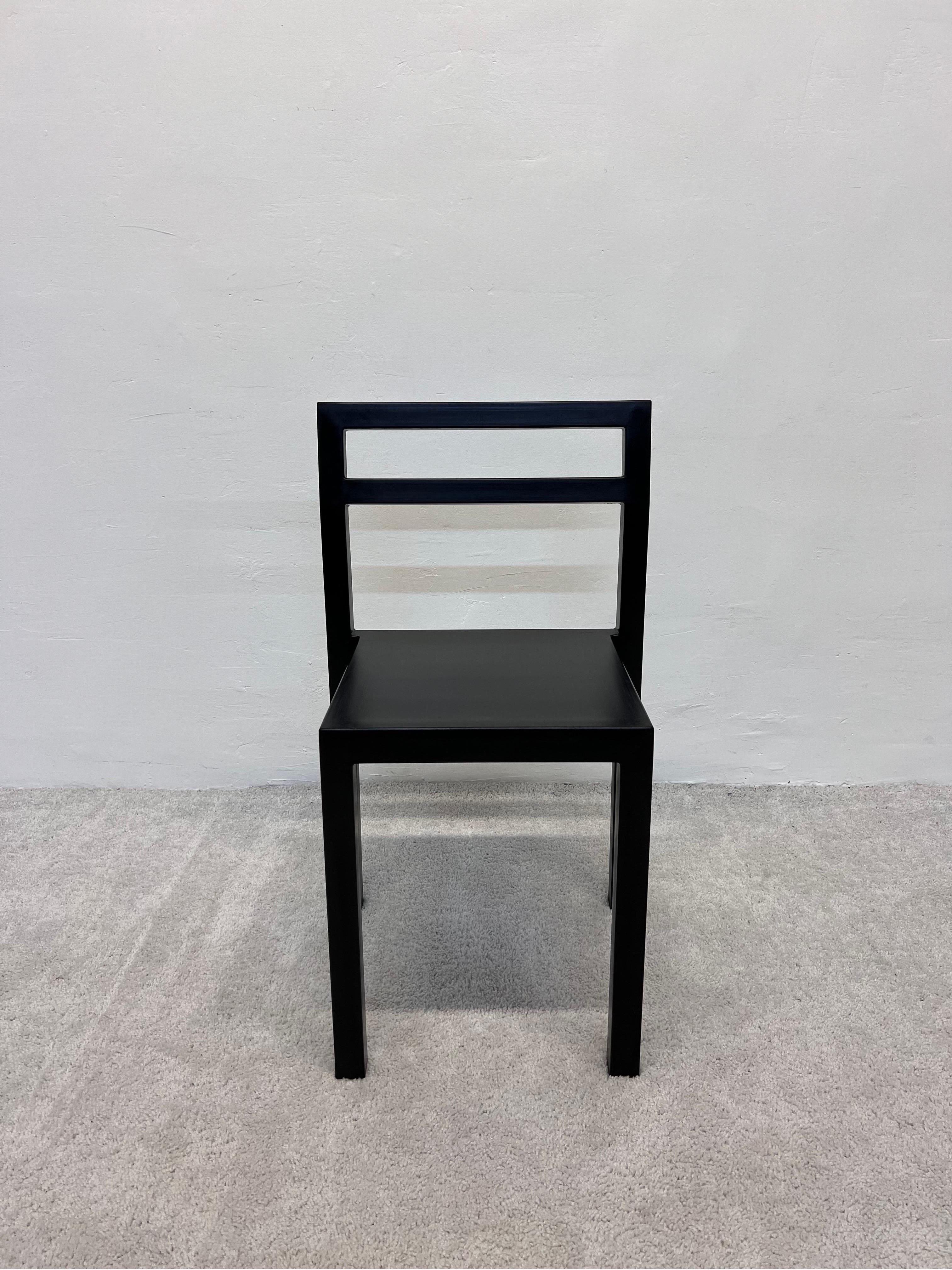 NON chair in black PUR-Rubber over a steel frame designed by Boris Berlin and Paul Christensen for Kallemo AB Sweden.

NON is a monoblock chair moulded in PUR-rubber in one shot. Geometrically straight yet comfortable, thanks to the softness of