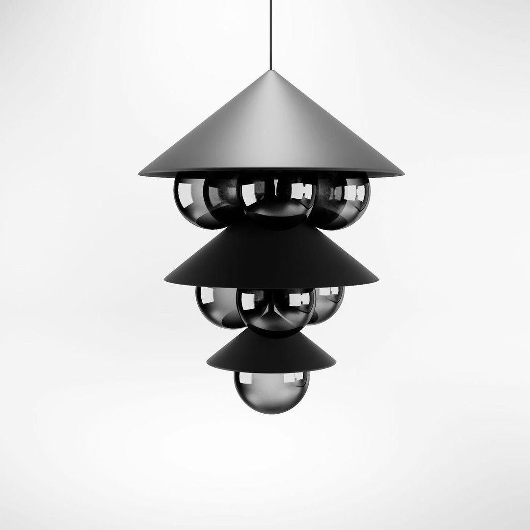 Black Nonla Pendant Lamp II by Kasadamo
Dimensions: D 37.5 x H 62.5 cm
Materials: steel, aluminium, glass
Also Available: Other size, color, and glass colors available,

All our lamps can be wired according to each country. If sold to the USA