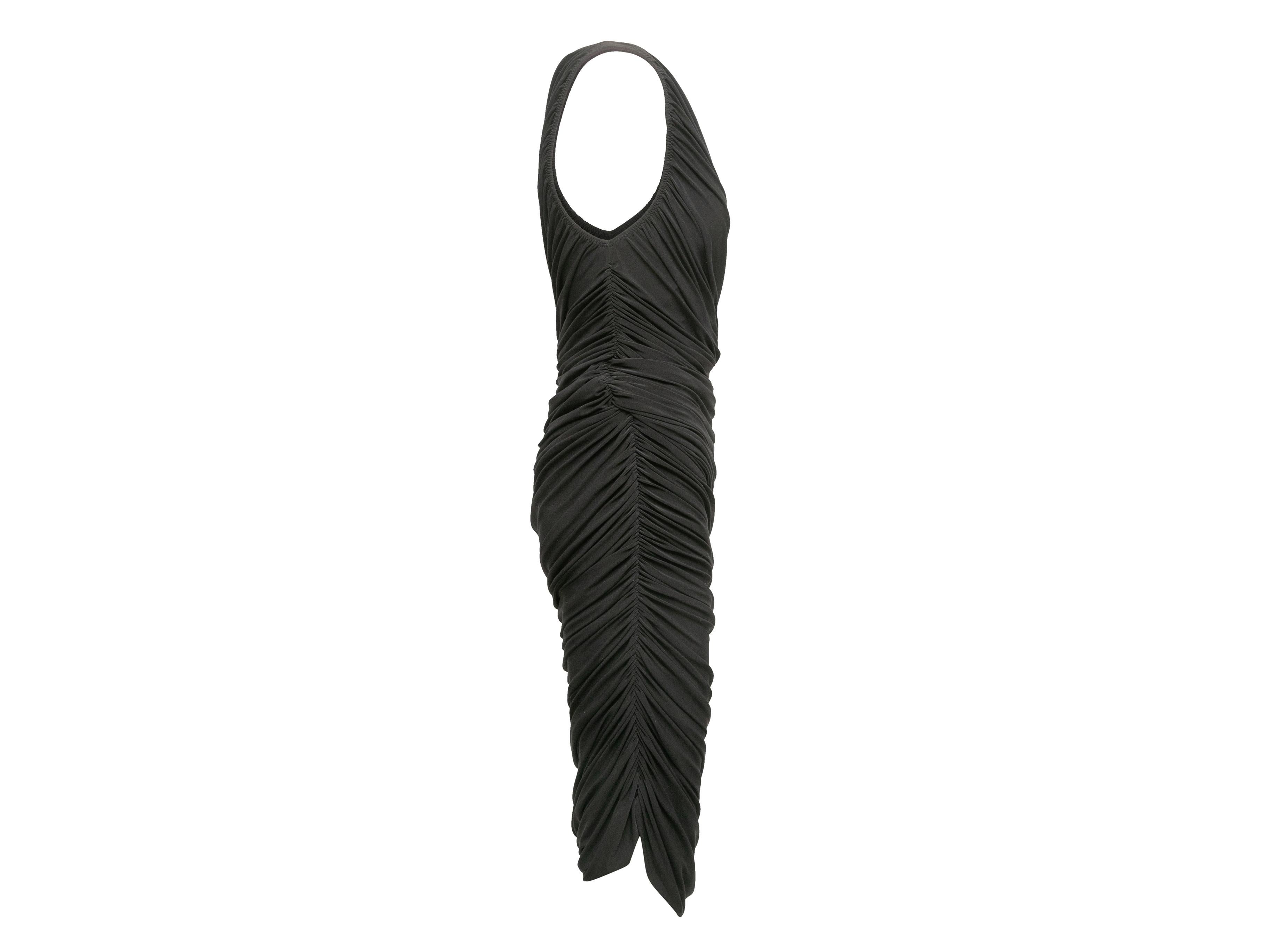 Black one-shoulder ruched Diane dress by Norma Kamali. Fitted throughout. 27