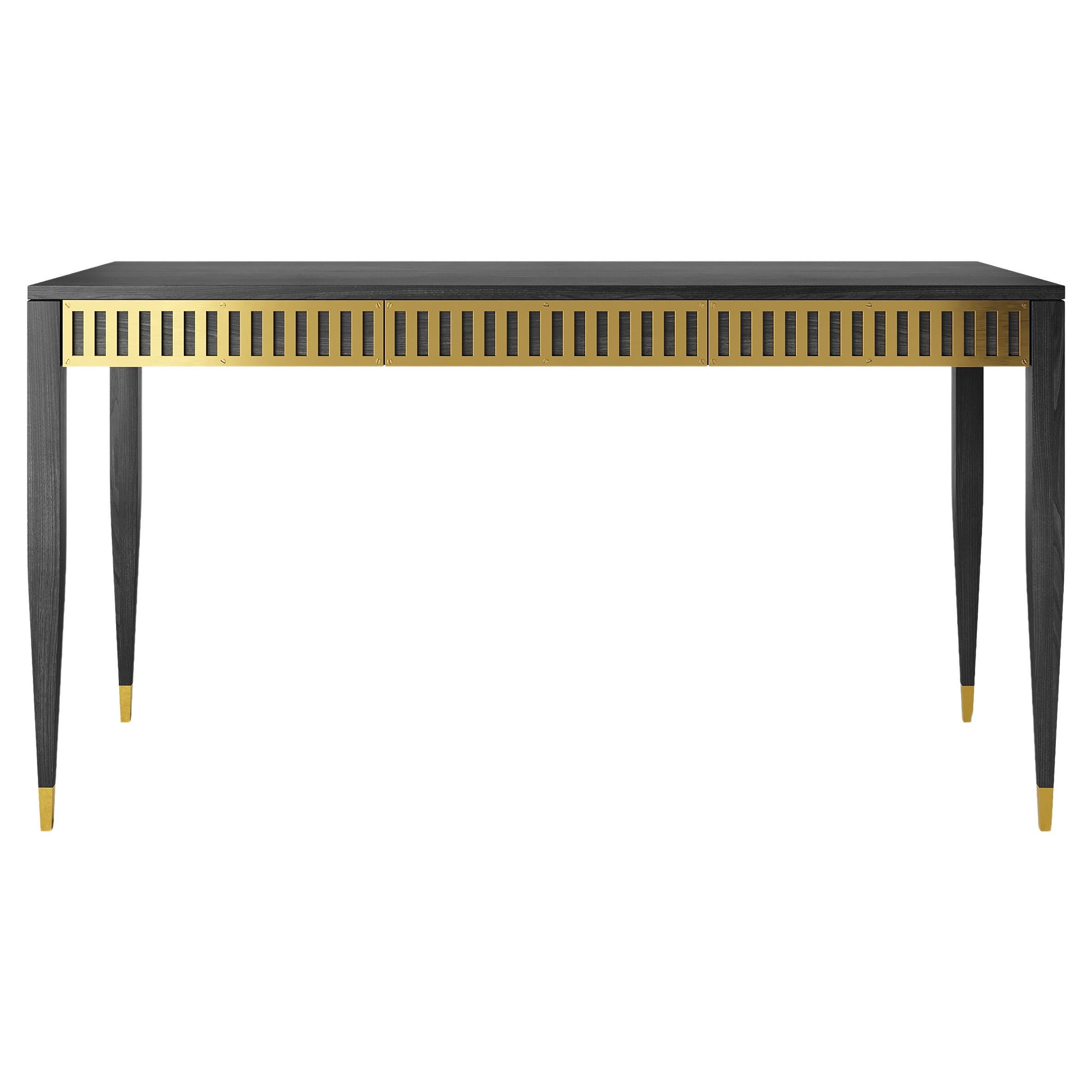 Black oak desk with three drawers with brass fronts in mid century modern style For Sale