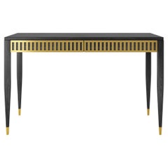 Black oak desk with two drawers with brass fronts in mid century modern style