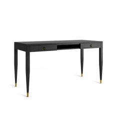 Black oak desk with two solid drawers and shelf in mid century modern style