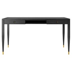 Black oak desk with two solid drawers and shelf in mid century modern style