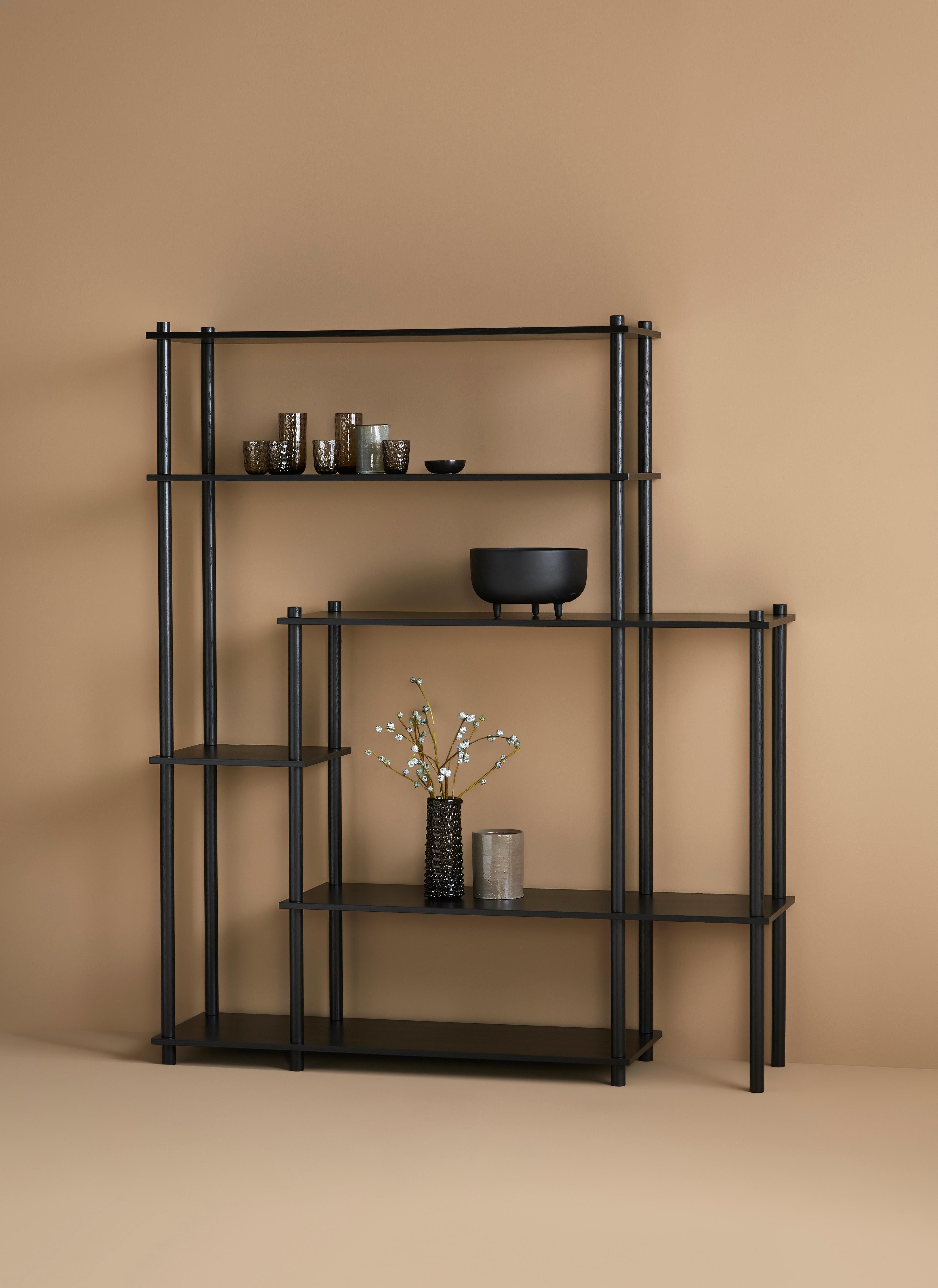 Black oak elevate shelving XI by Camilla Akersveen and Christopher Konings.
Materials: metal, oak.
Dimensions: D 40 x W 153.2 x H 182.6 cm
Available in matt lacquered oak or black oak. Different shelving sistems available.

Camilla Akersveen