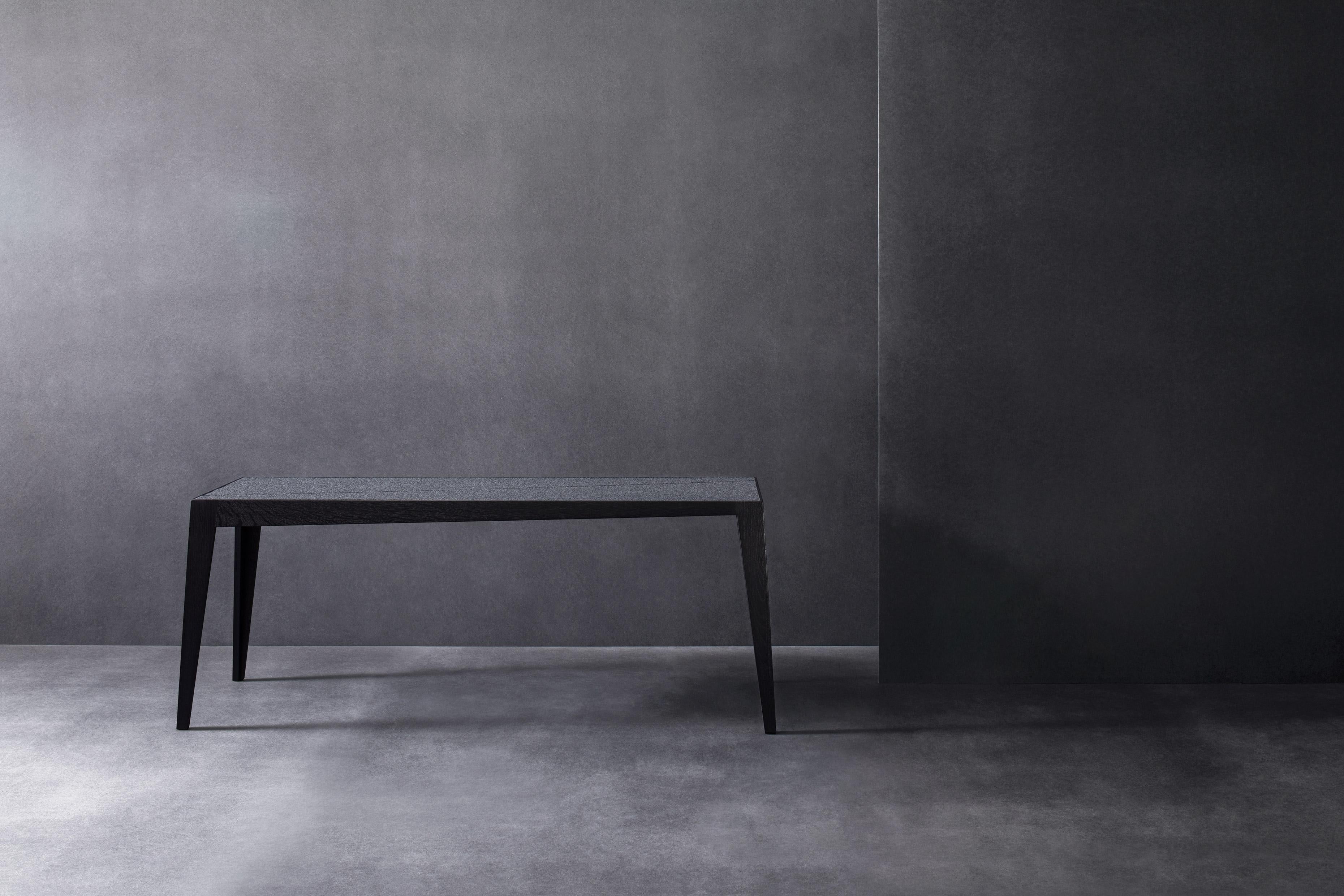 Black oak tocker bench by Matthias Scherzinger
Dimensions: H 48 x W 40 x L 120 cm
Materials: Oak black stained hard wax
 seat: needled felt black-grey

Also available in natural Oak.
Other sizes and types of wood.

The Tocker is a