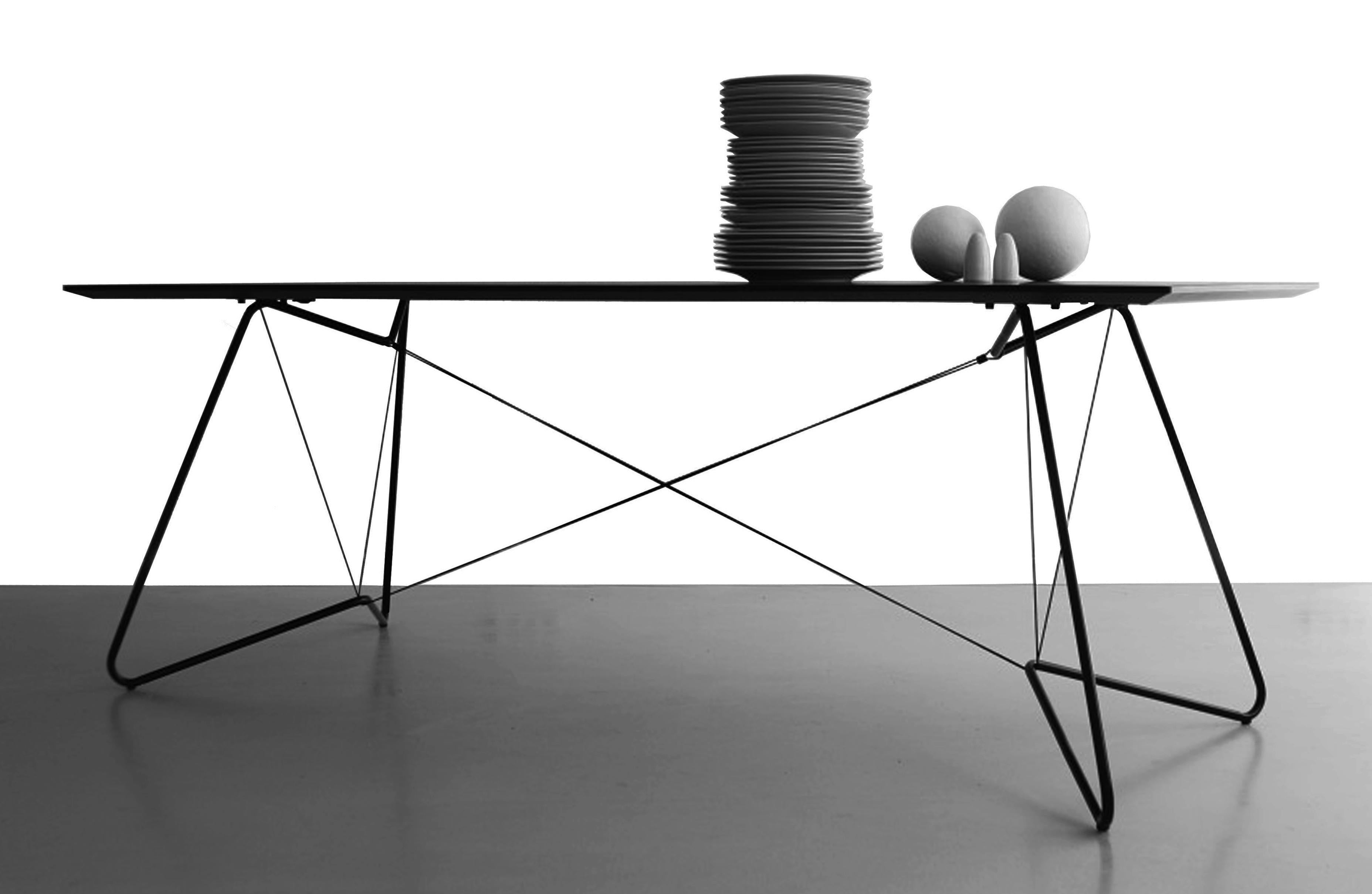 Black Oas Table 200 by OK Design
Dimensions: D 90 x W 200 x H 74 cm.
Materials: Powder-coated metal, laminated MDF, paracord.

Available in black or white.
Available in 170 or 200 cm. Please contact us.

The OAS Table (On-a-string) is a minimal and