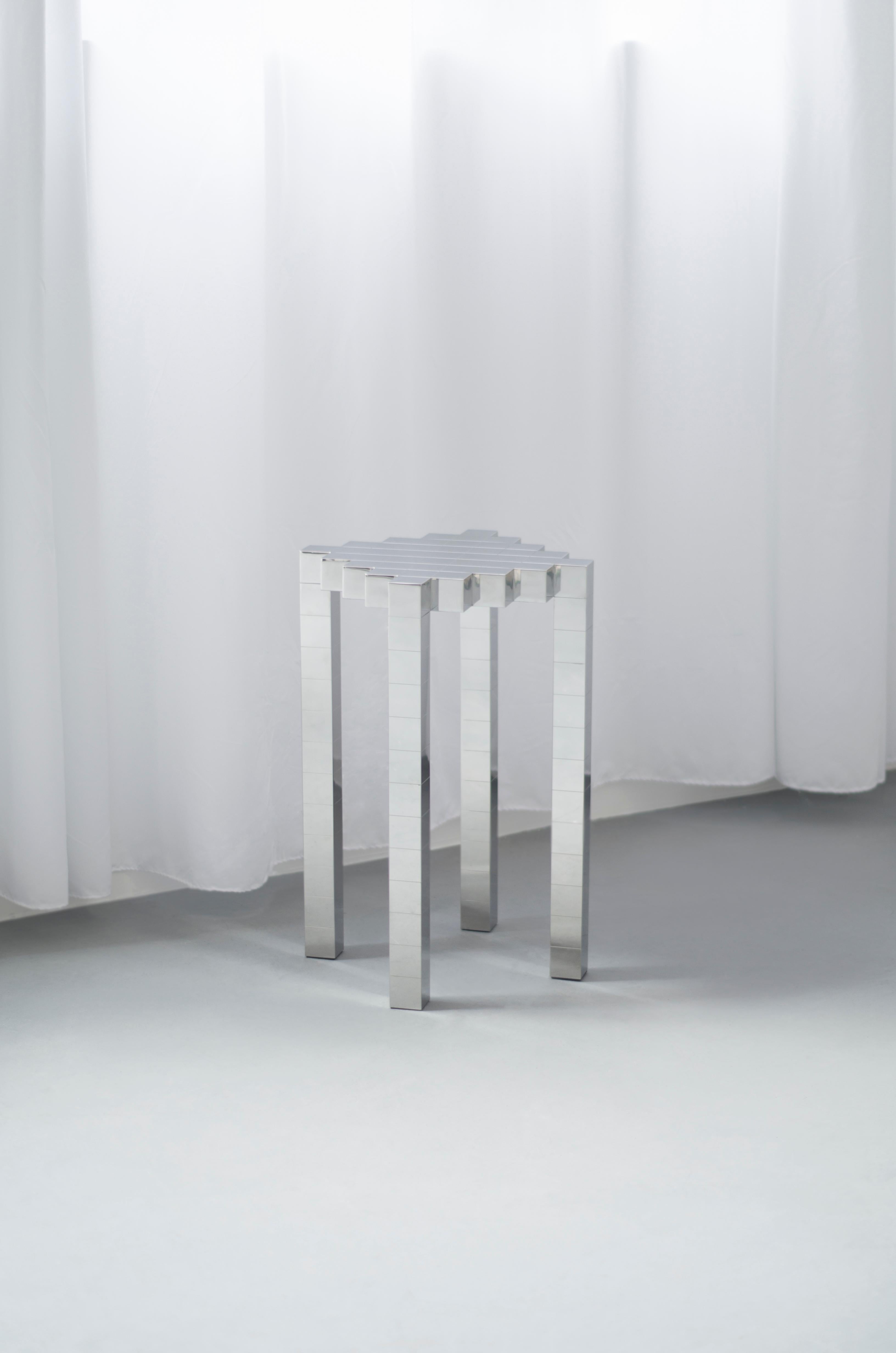 The Black Ocean Side Table comes from THESHAW's Future Vestige series. This highly geometric tabletop takes inspiration from the calm ocean that stretches out endlessly. Fashioned as if the water was sectioned into many iridescent cubes,