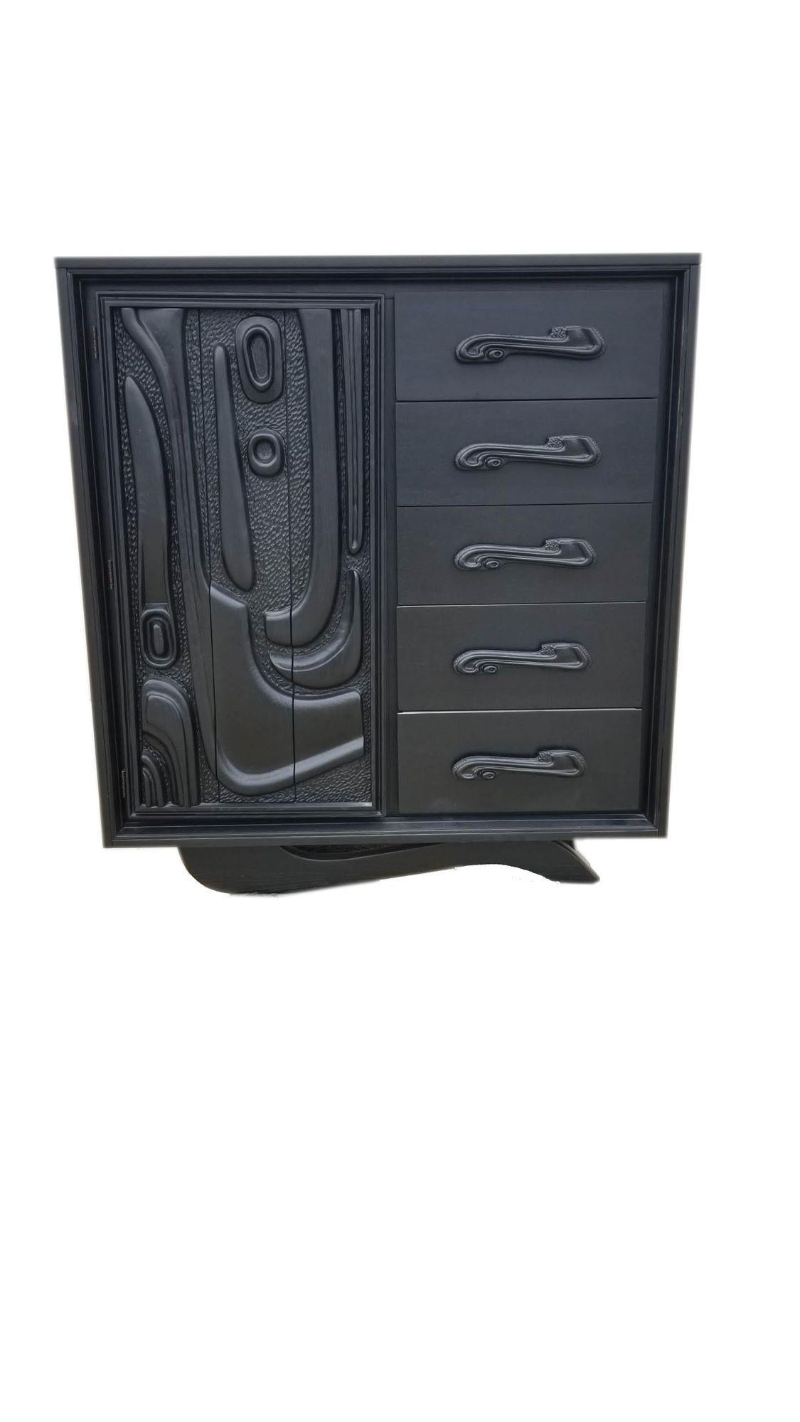 Late Mid-Century black lacquered sculpted walnut 'Oceanic' highboy dresser/armoire combo cabinet by Pulaski Furniture Corporation, circa 1965 which perfectly encapsulates the California surf mentality of the 1960s, making this piece a highly