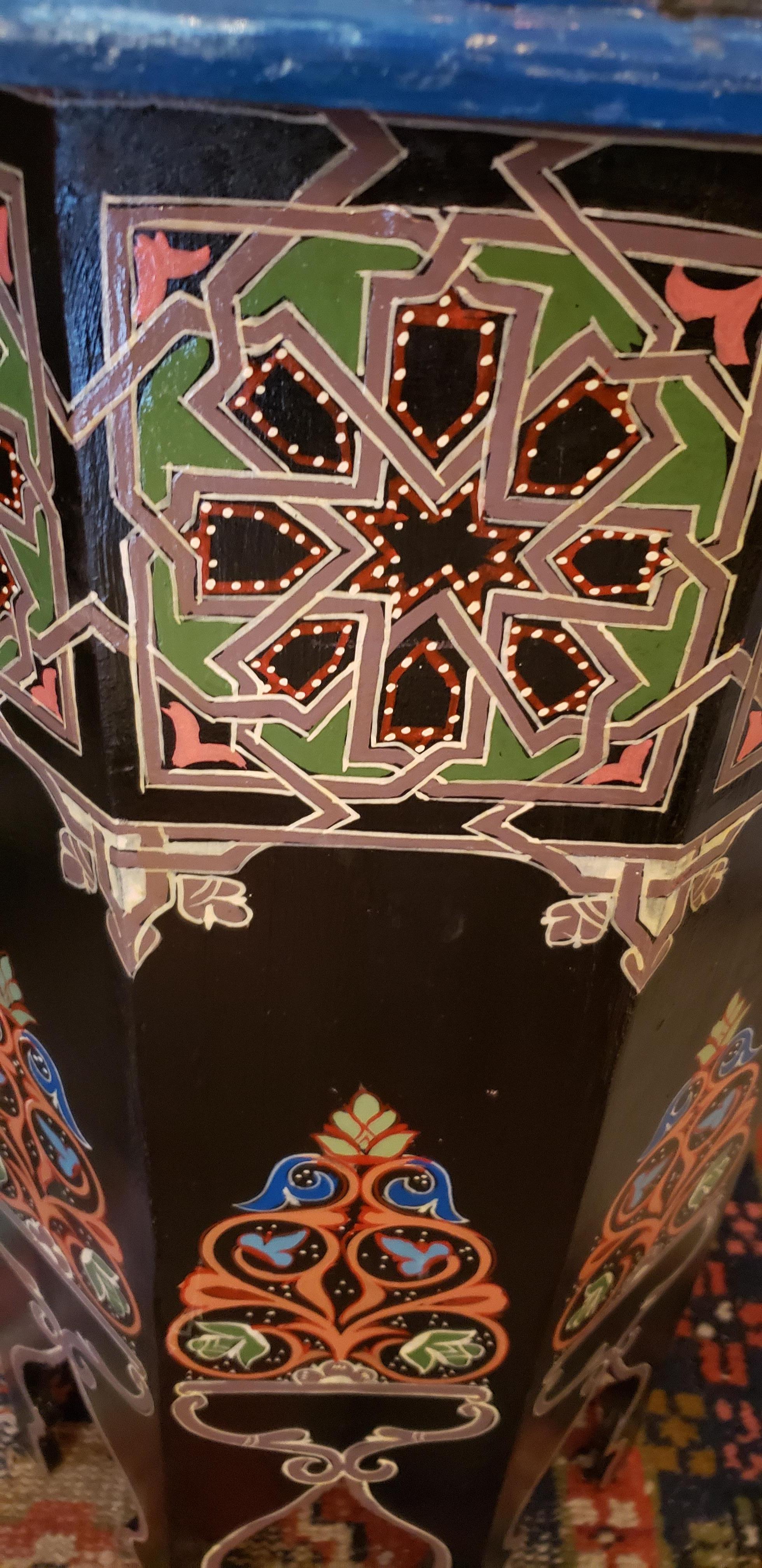 Rare find! 100% hand painted Moroccan octagonal shape side table. Great handcraftsmanship throughout. Beautiful add-on to your decor. This table measures approximately 28 inches in height, 16