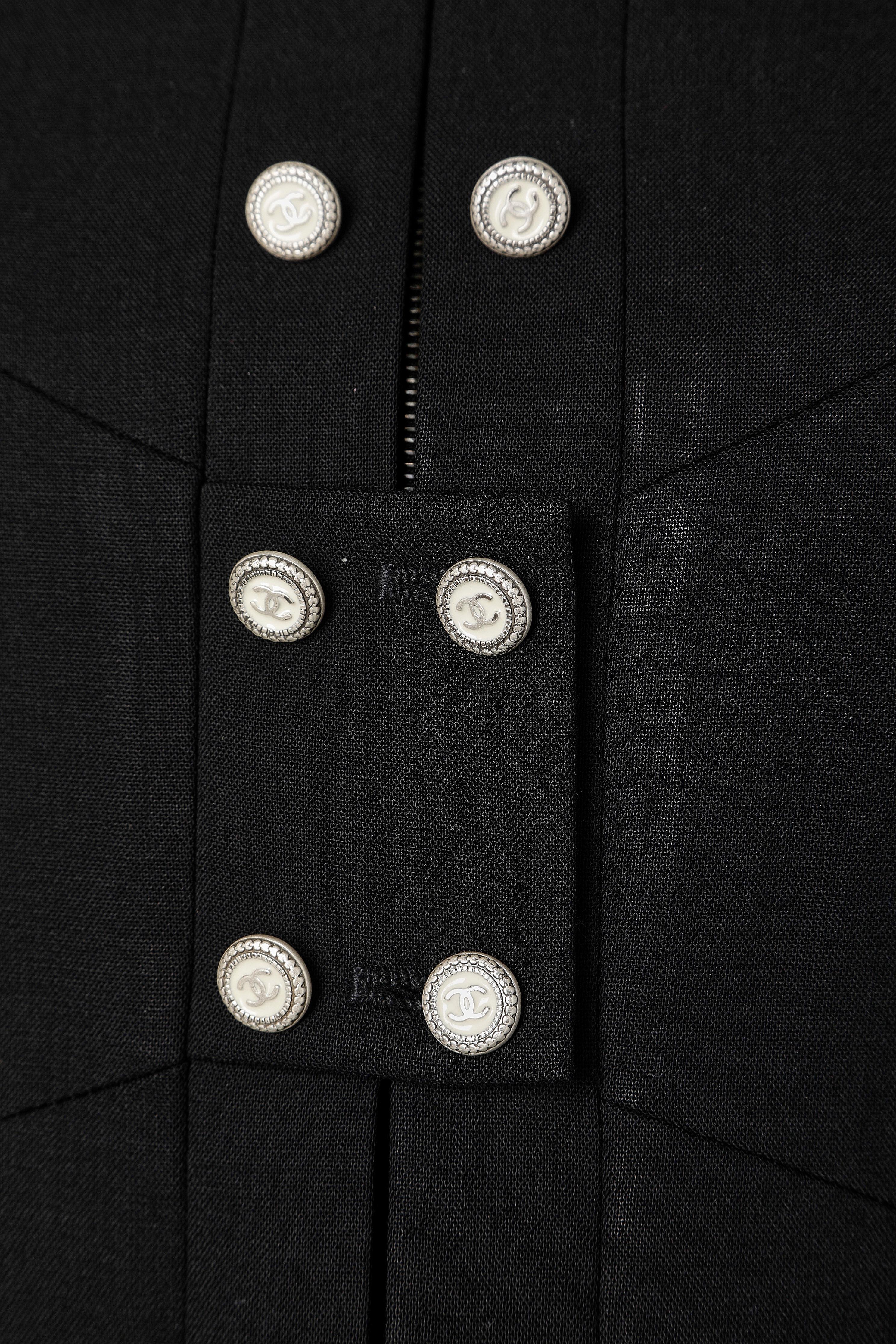 Black officier's style  jacket with double row of branded buttons.
Size 34 (XS) 