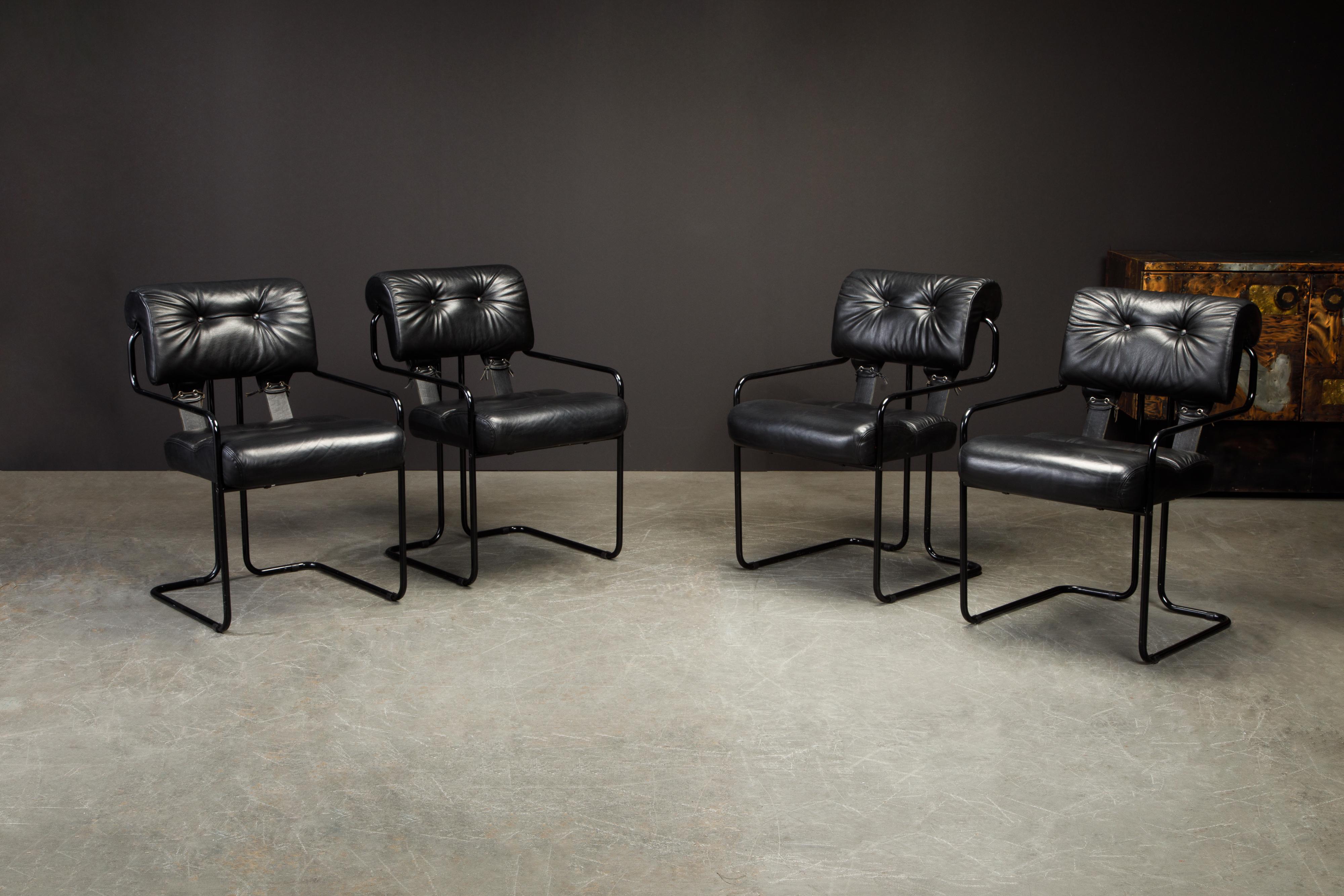 Currently, the most coveted dining chairs by interior designers are the 'Tucroma' chairs by Guido Faleschini for i4 Mariani, and we have this incredible set of four (4) vintage Tucroma armchairs in beautiful black leather with rare black frames