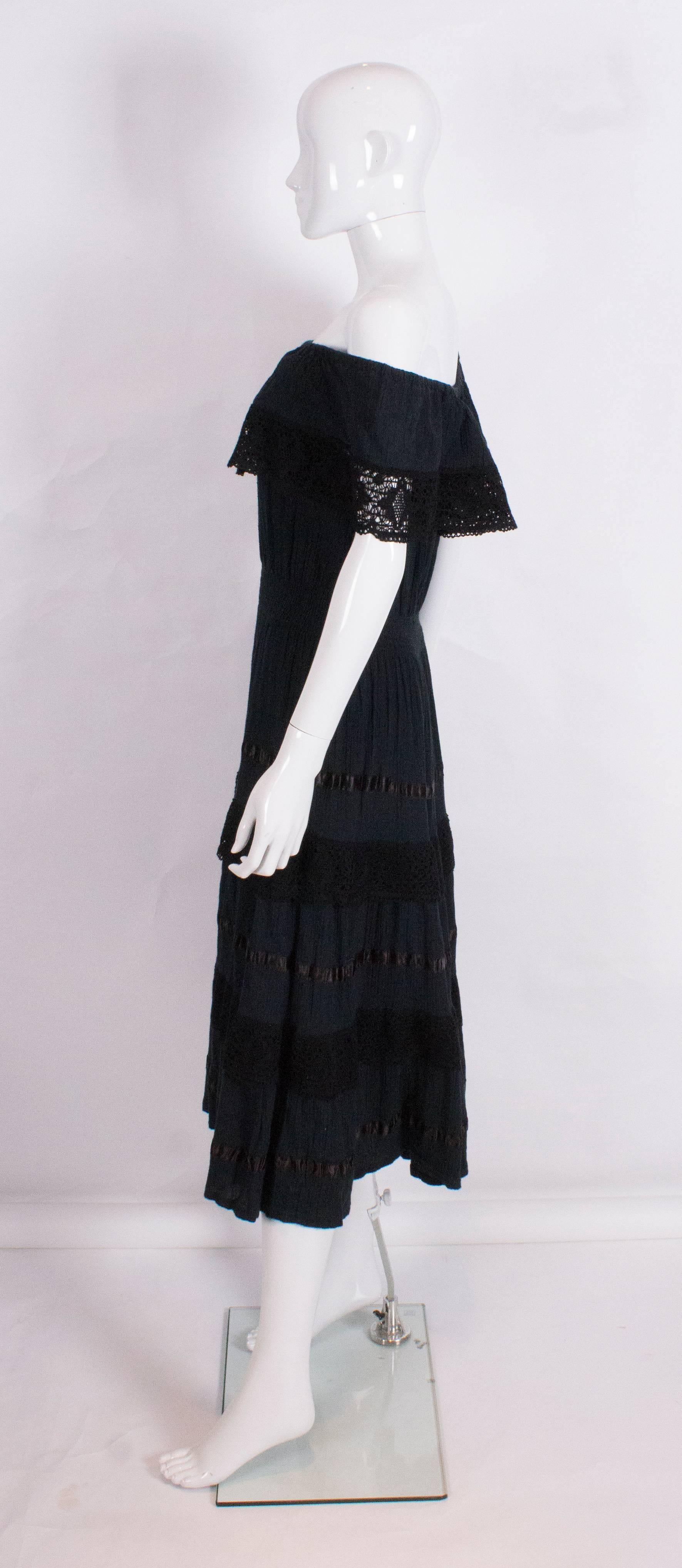 Black On/Off Shoulder Dress with Crochet Border and Ribbon Detail In Excellent Condition For Sale In London, GB