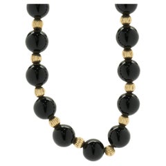 Collier de perles en onyx noir et or jaune 14 carats