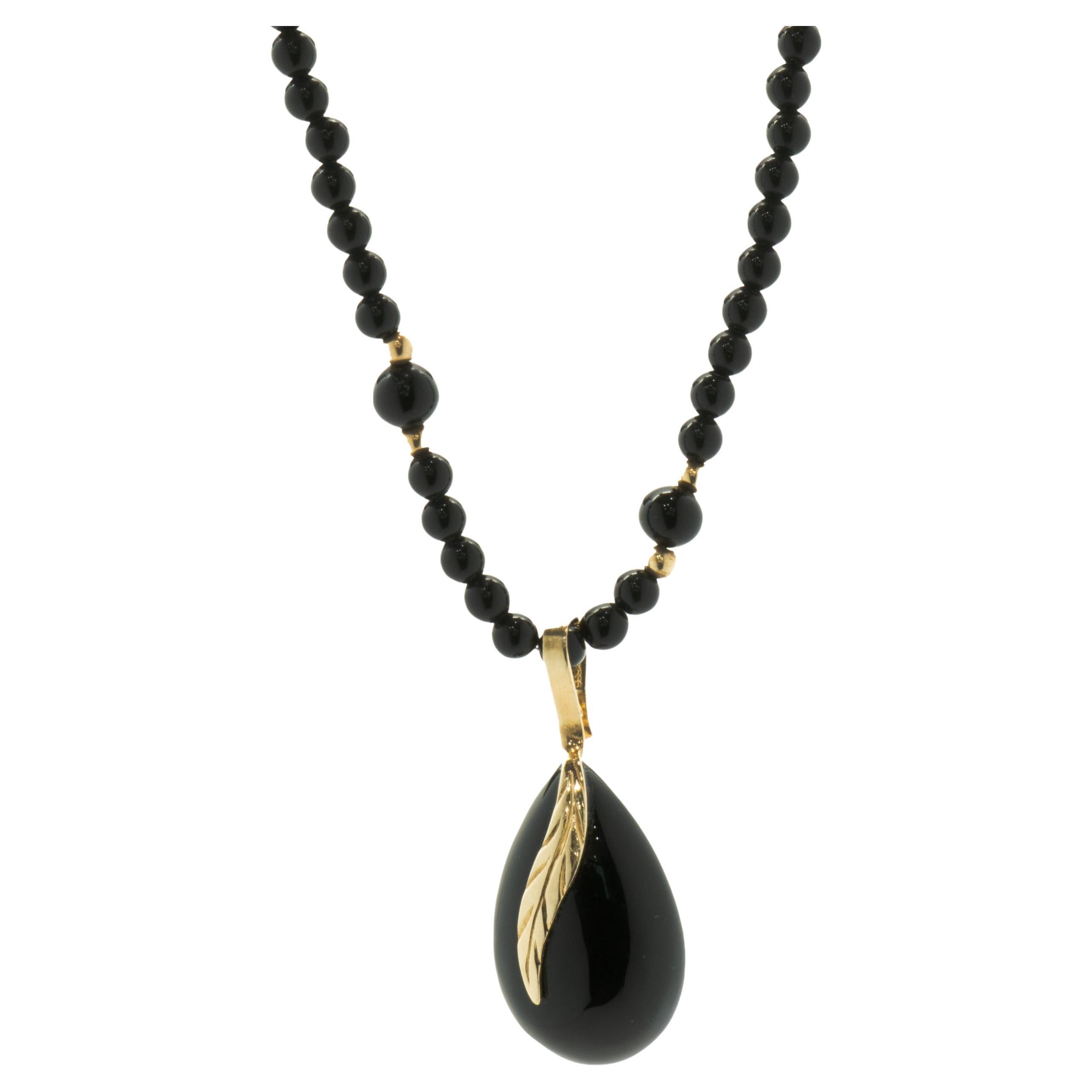 Black Onyx & 14 Karat Yellow Gold Beaded Necklace with Onyx Drop