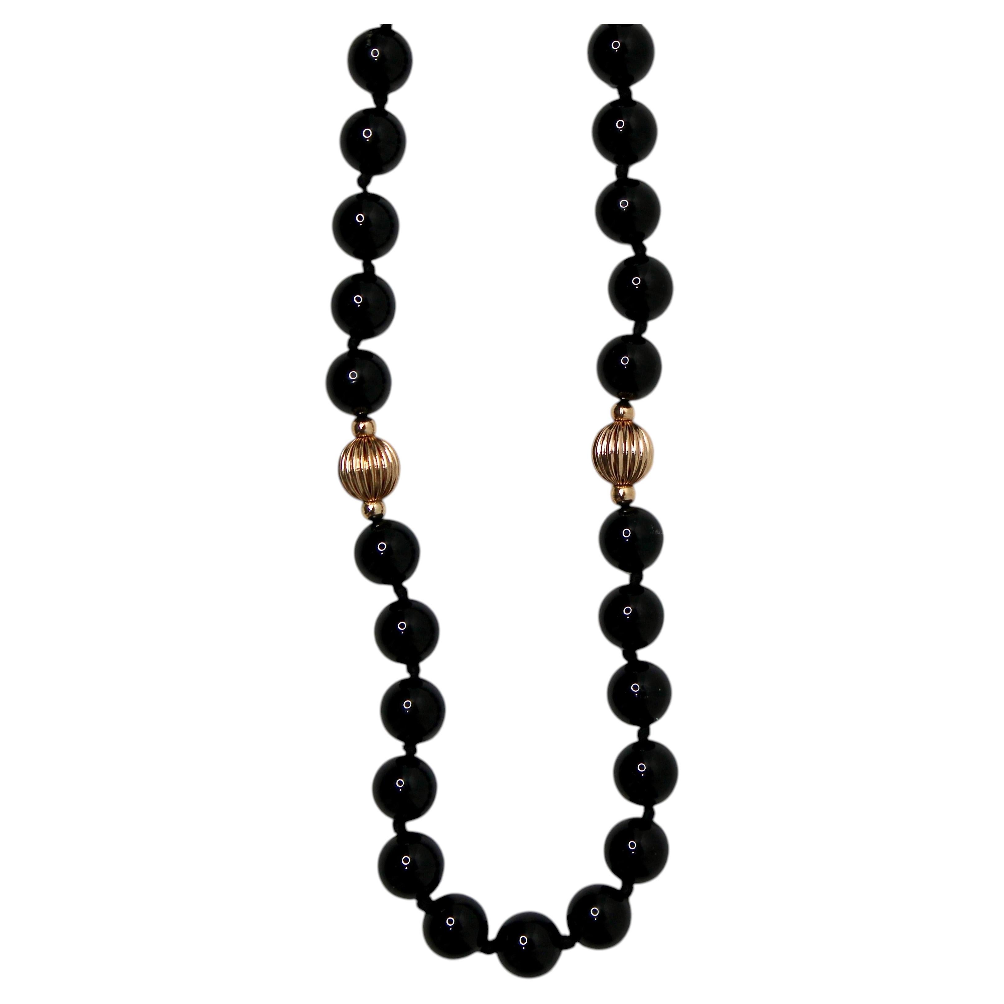 Collana di perline vintage in onice nero e oro giallo 14k