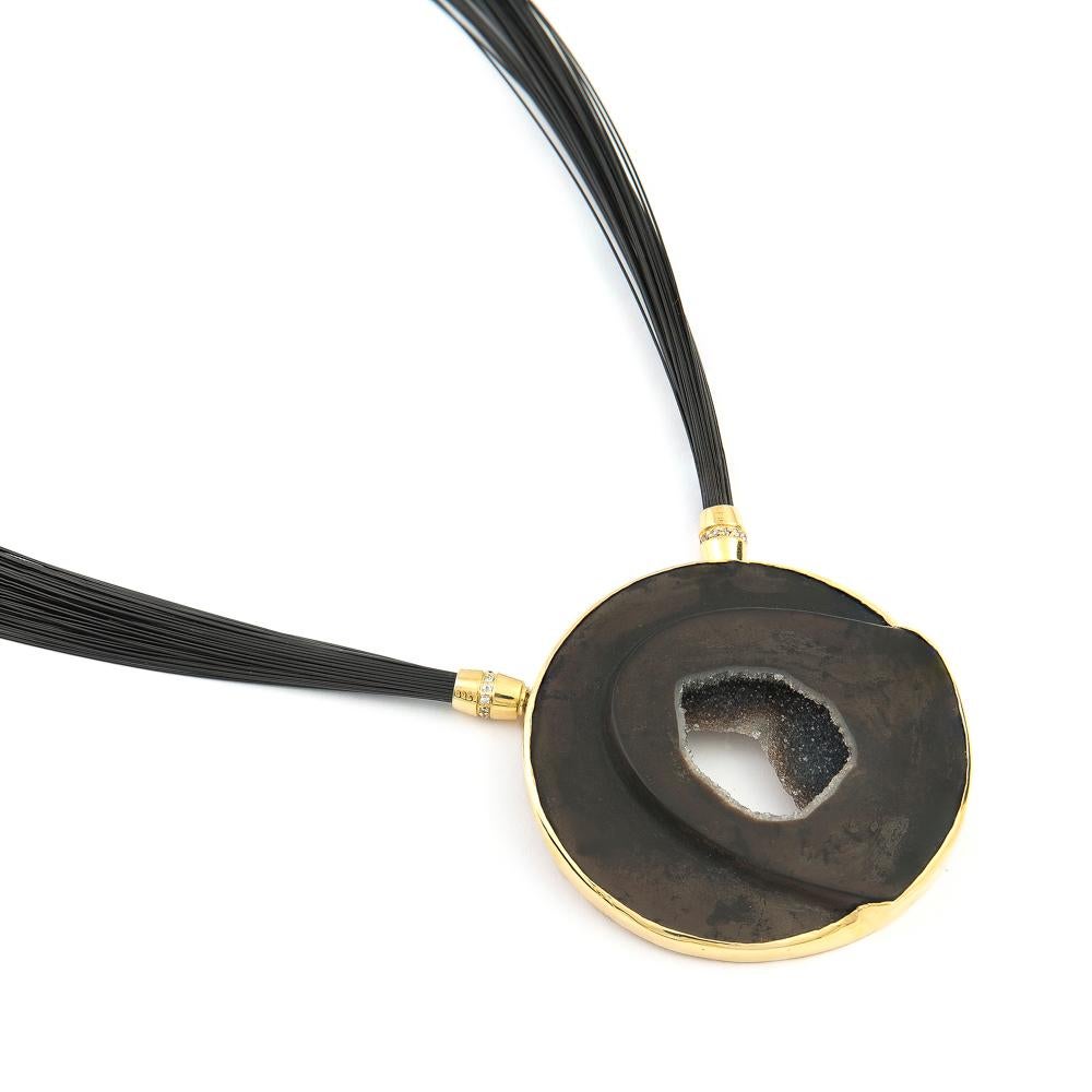 This Black Onyx Druzy Pendant is set in 18 Karat Gold with an 18 Karat Yellow Gold and Diamond Clasp. The stone is hand carved and signed by the world renowned Dieter Lorenz, one of the top names in contemporary gem carving. Mounted in 18 Karat Gold
