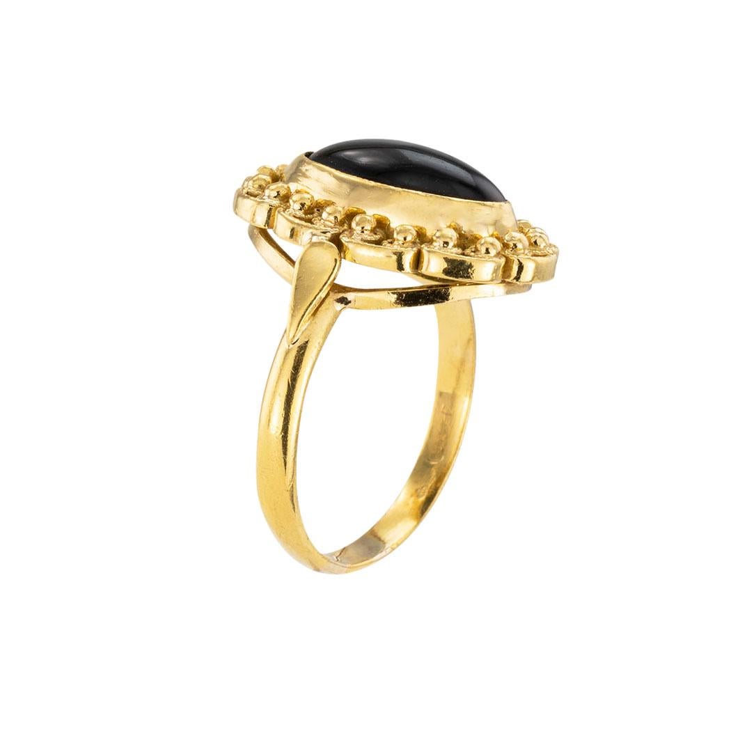 gold ring design with black stone