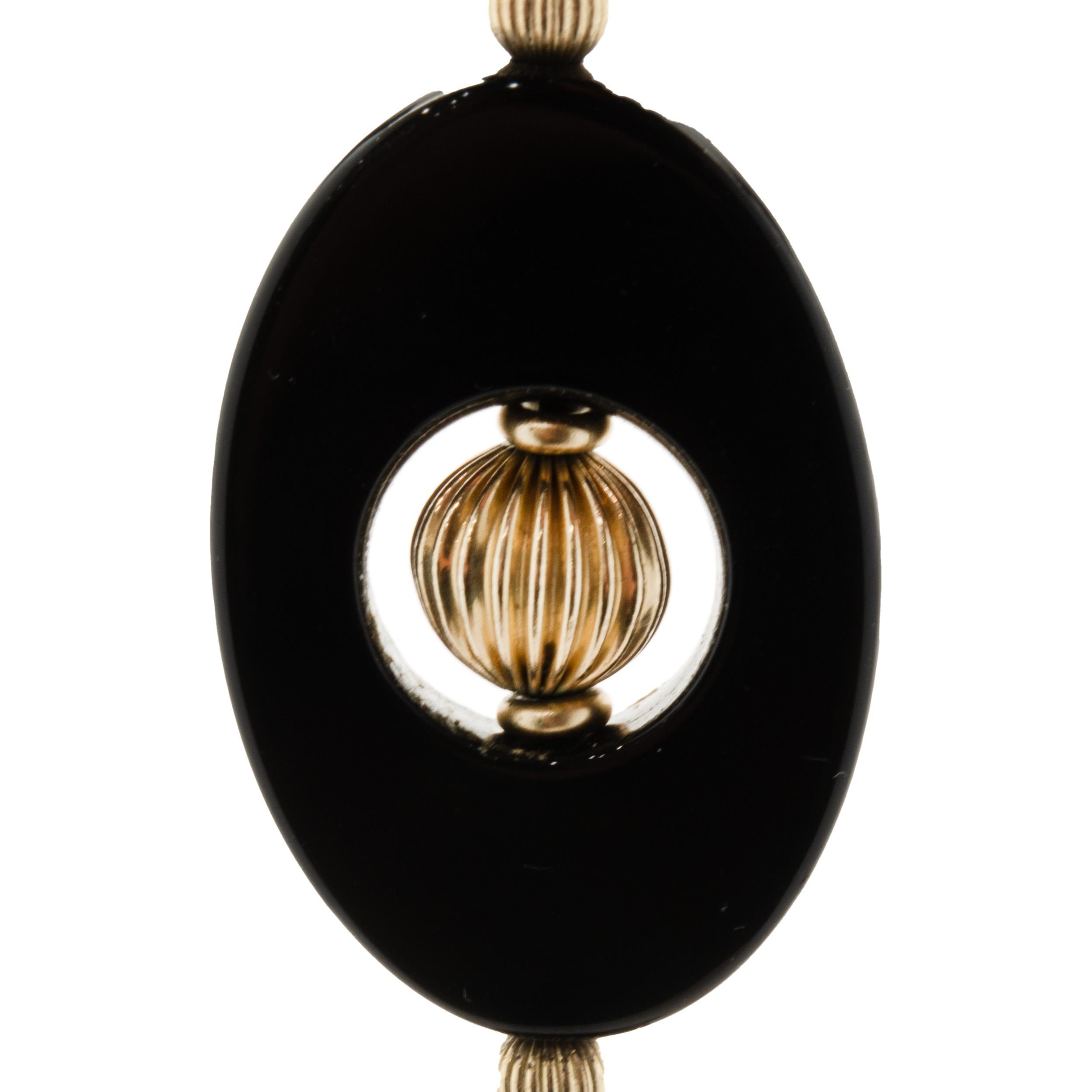 Designer: custom 
Material: 14k yellow gold / Black Onyx
Dimensions: necklace measures 33-inches in length
Weight: 101 grams
