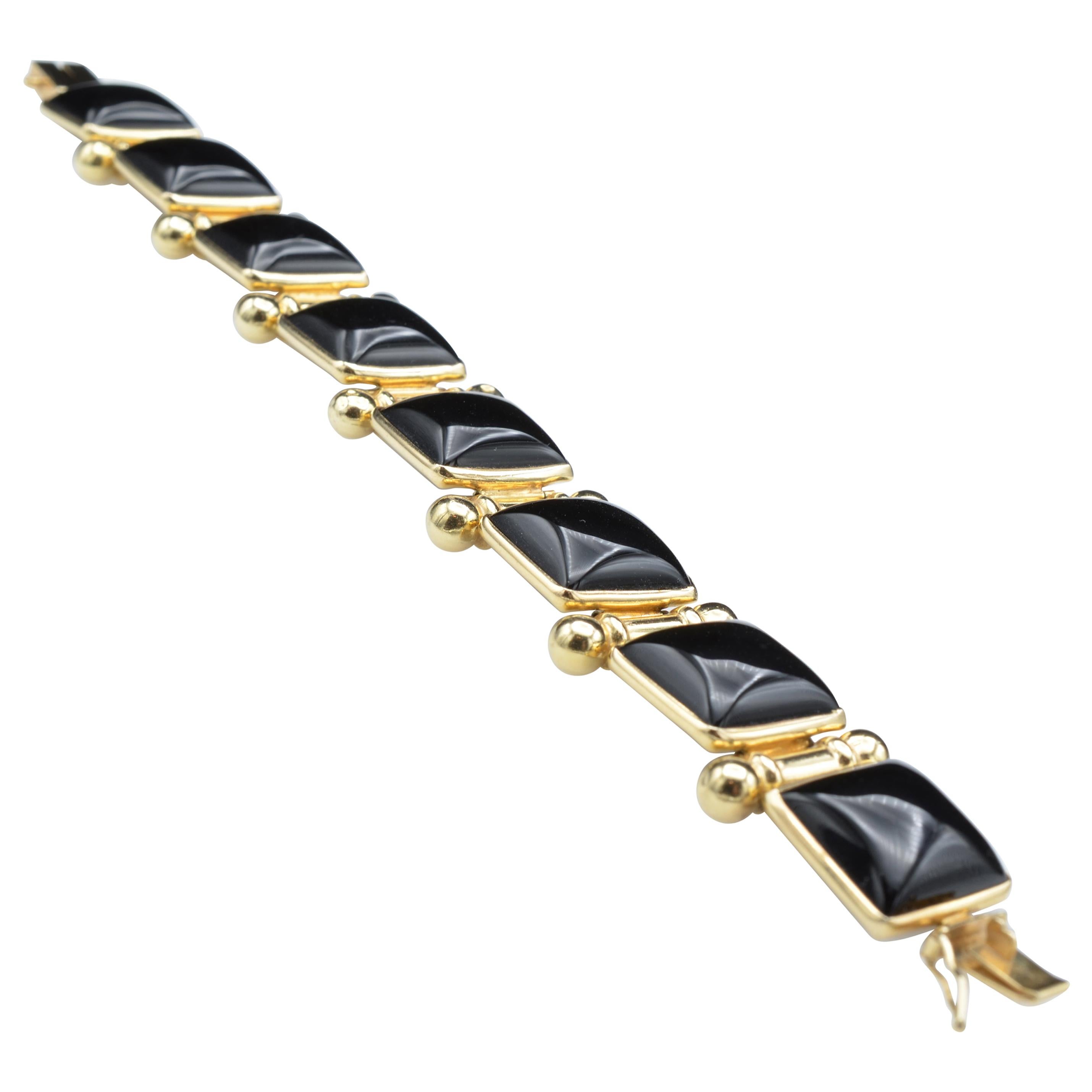 Black Onyx and 14 Karat Gold Link Bracelet